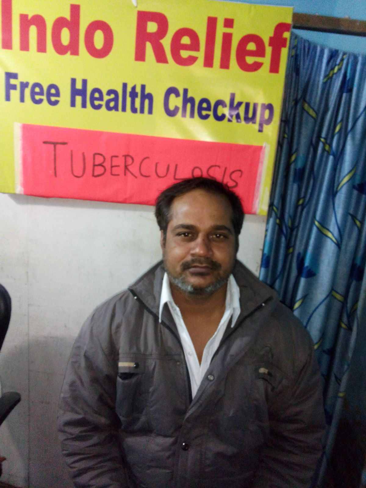 Meet Janesh. He says that he coughs up so much sputum that he has trouble breathing. He lives with his wife and 5 children. He and his wife's entire families live in the same slum. 