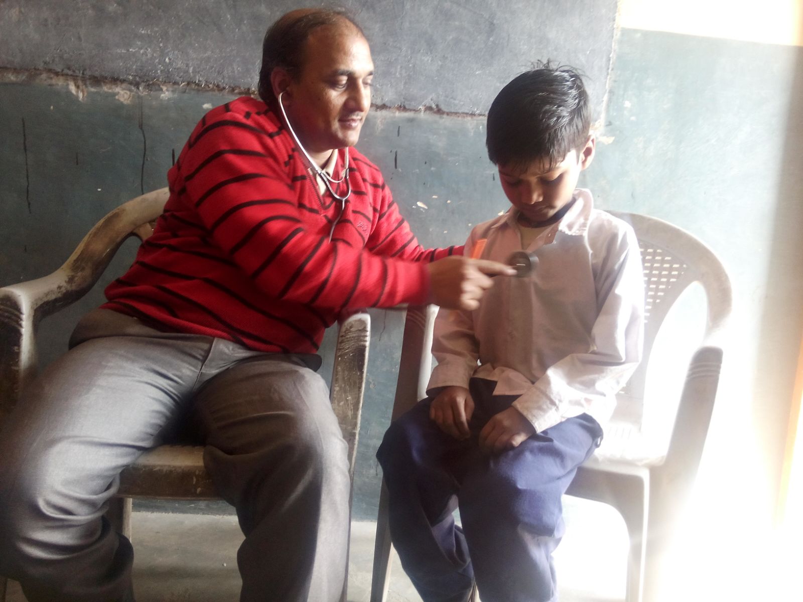 This is Aayush. He is 7 years old. His parents told us they are worried about him because he is lethargic and has trouble waking from sleep. He works with his father in the market on weekends and in the mornings. 