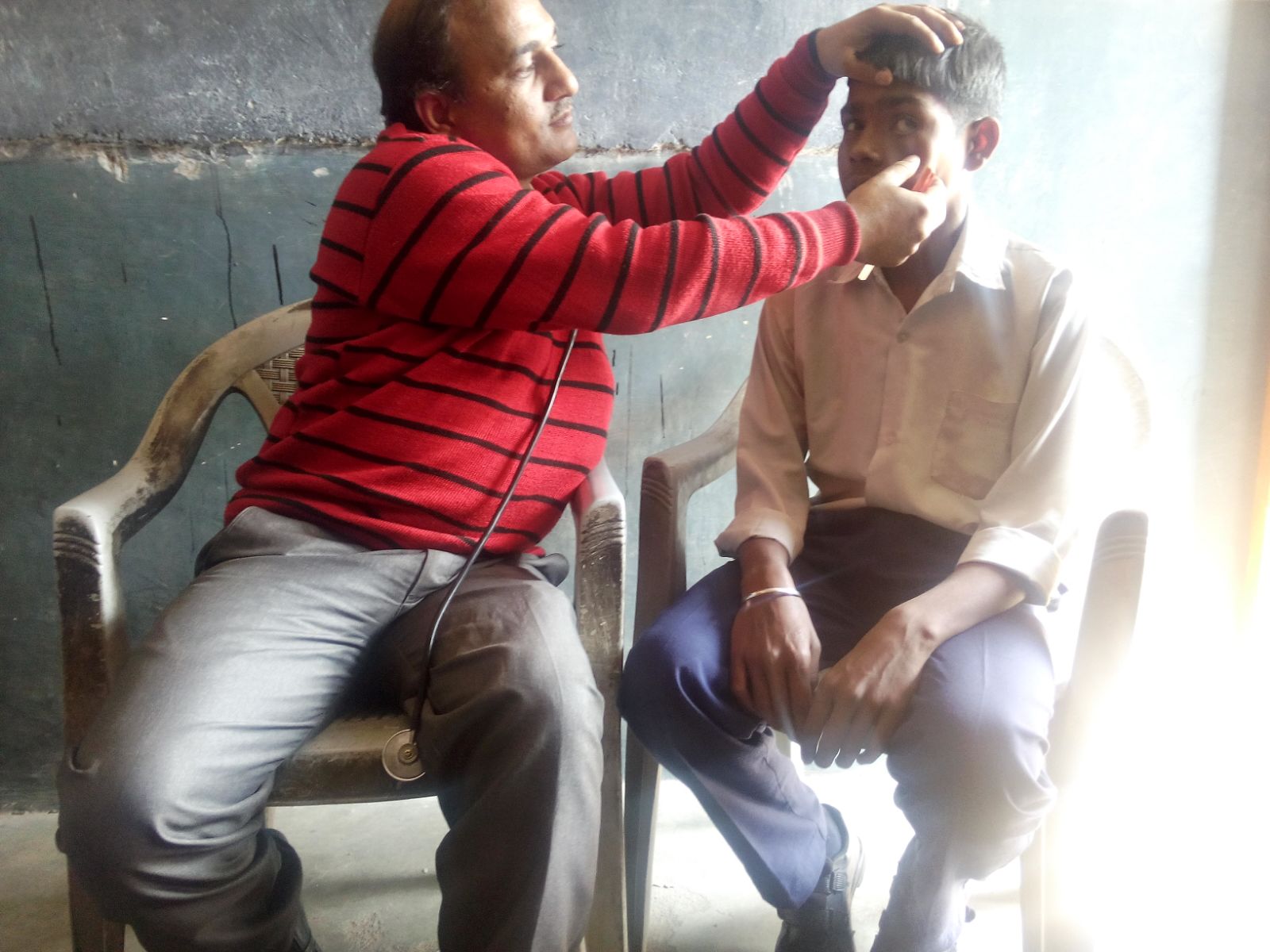 Meet Arjun. He is 11 years old. His left eye has been watering excessively the past week. He has trouble fully opening that eye and tells us it hurts when he keeps it open. There is redness and swelling around his eye. 