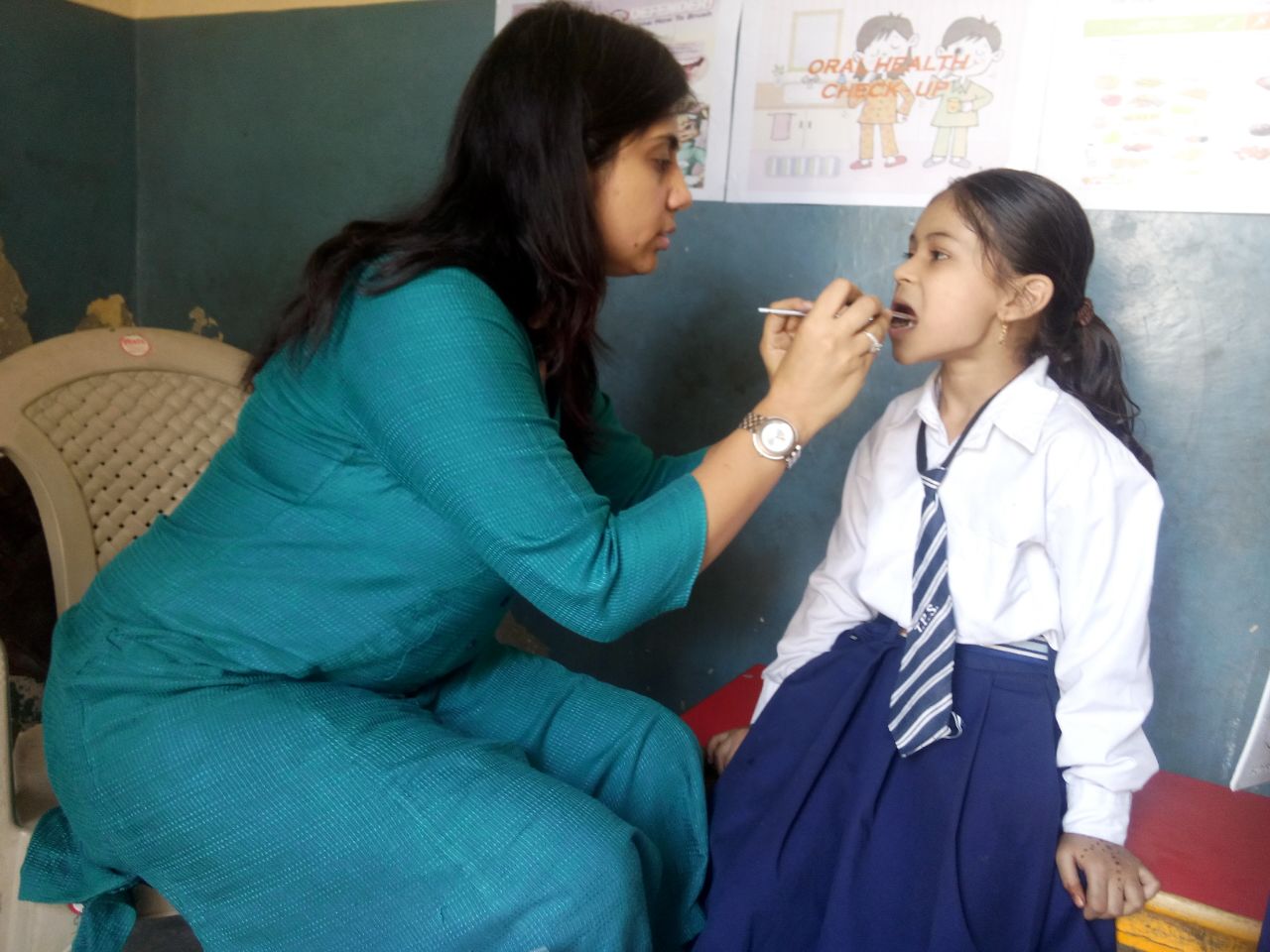 Meet Ishita. She is 7 years old. She had never used a toothbrush prior to our dental health camp. 