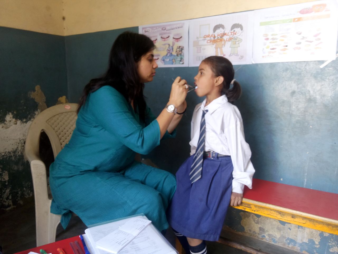This is Prisha. She is 7 years old. She has one younger sister and four older brothers. 