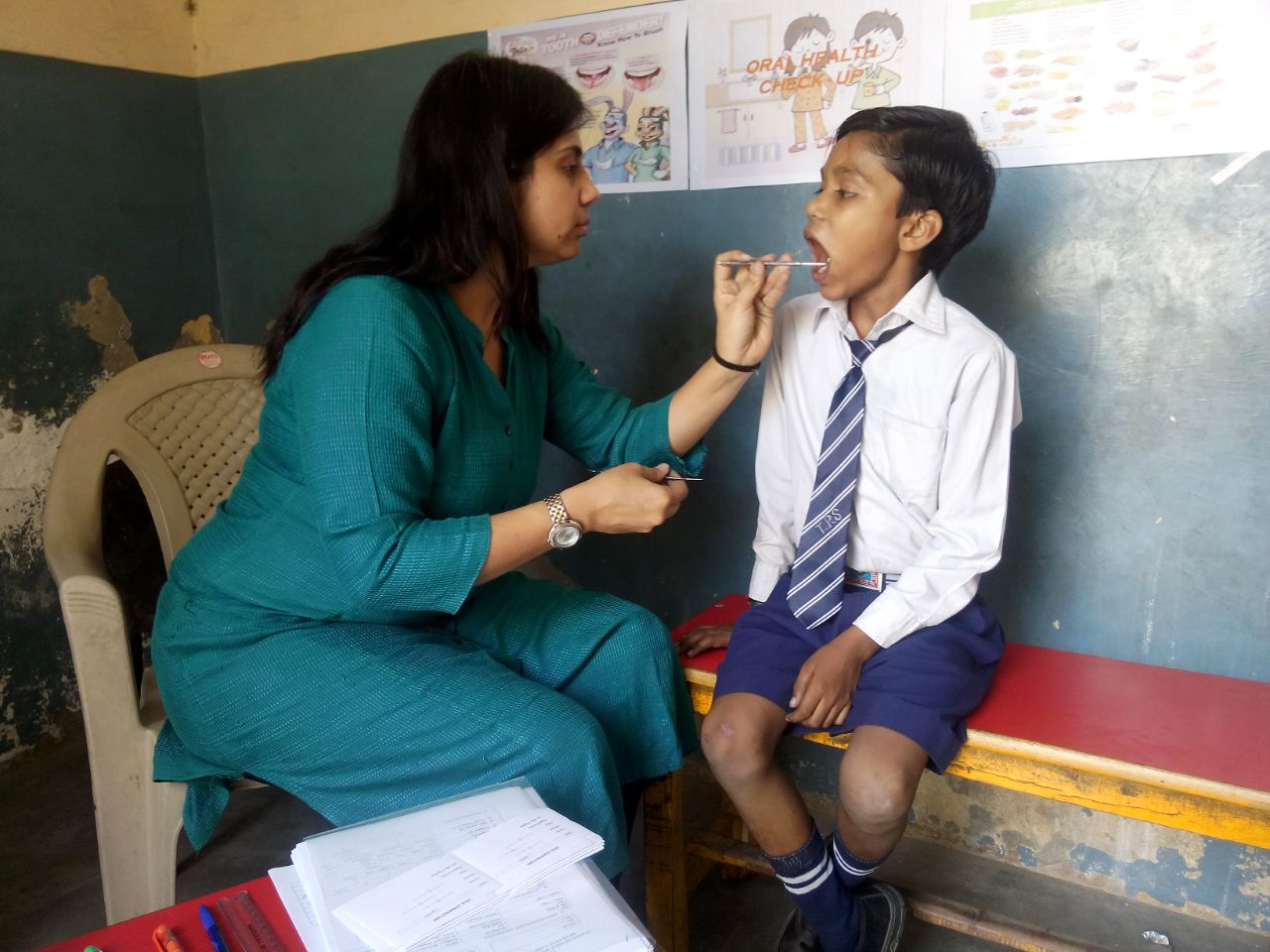 Meet Fuad. He is 5 years old. After this visit, he said he wants to be a dentist when he grows up. He likes the taste of the mouthwash we used. 