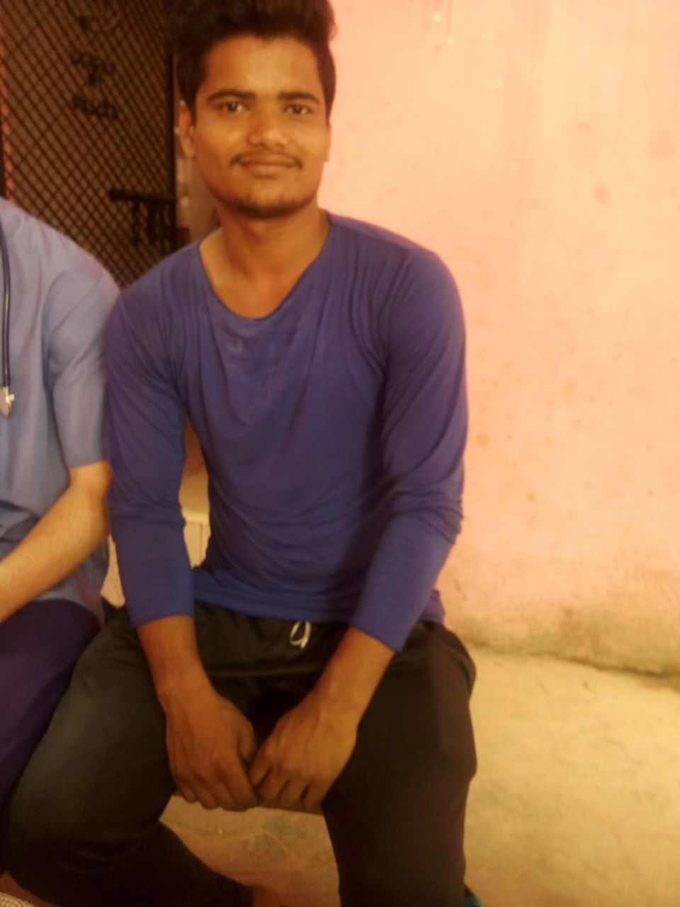 Meet Krish. He works as a tuk-tuk driver. He supports himself and his wife, as well as his parents and three younger siblings. He has been having a fever at night, with a runny nose. 