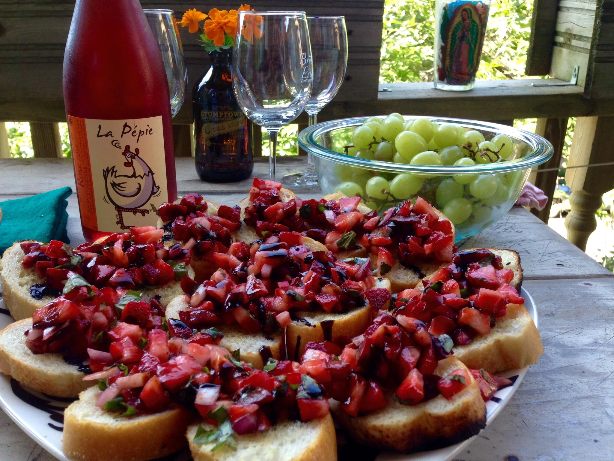 This is how we do bruschetta...cherry-strawberry-mint-basil and balsamic reduction drizzle!