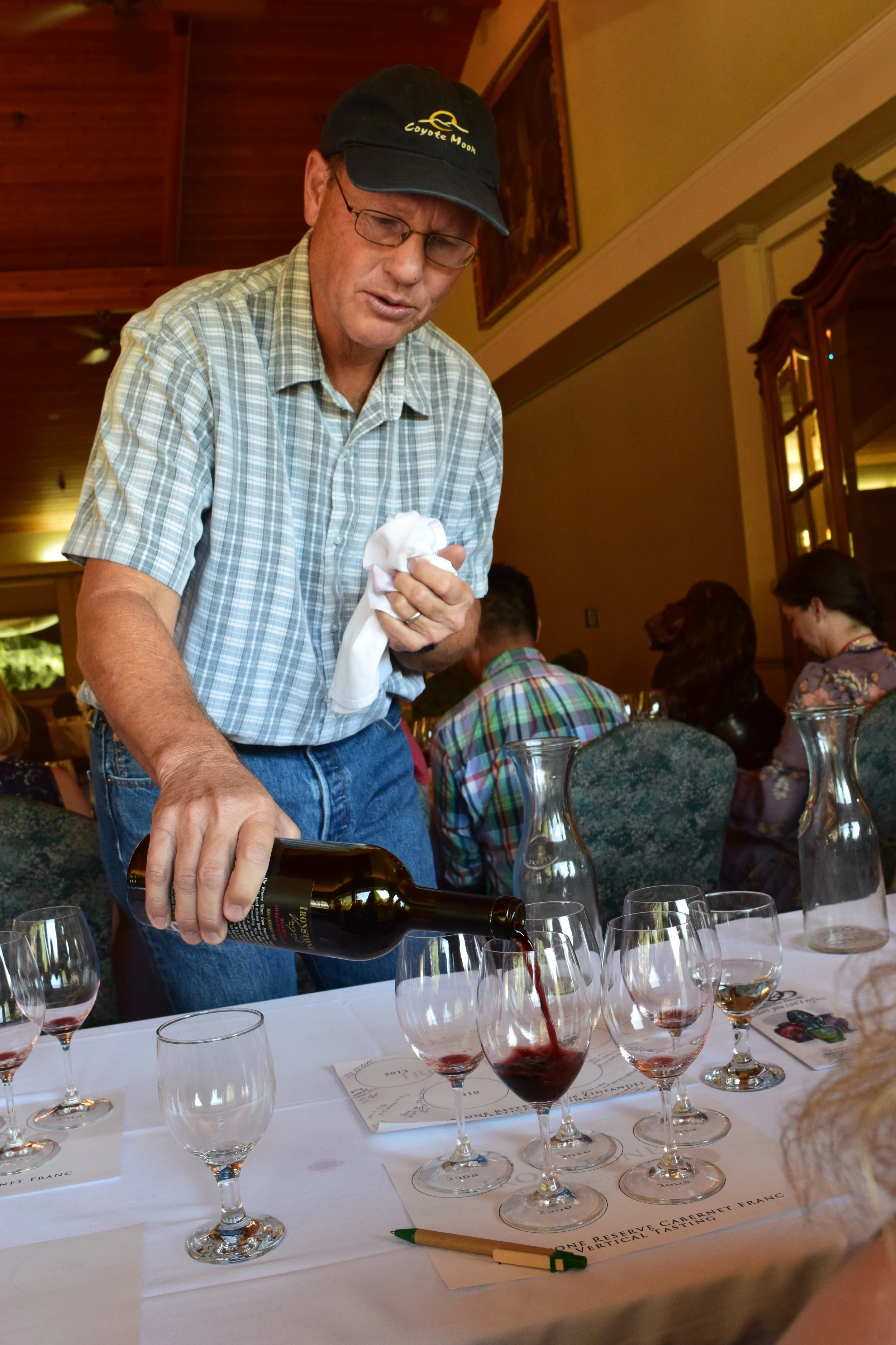 Winemaker Craig Rous pouring Cab Franc