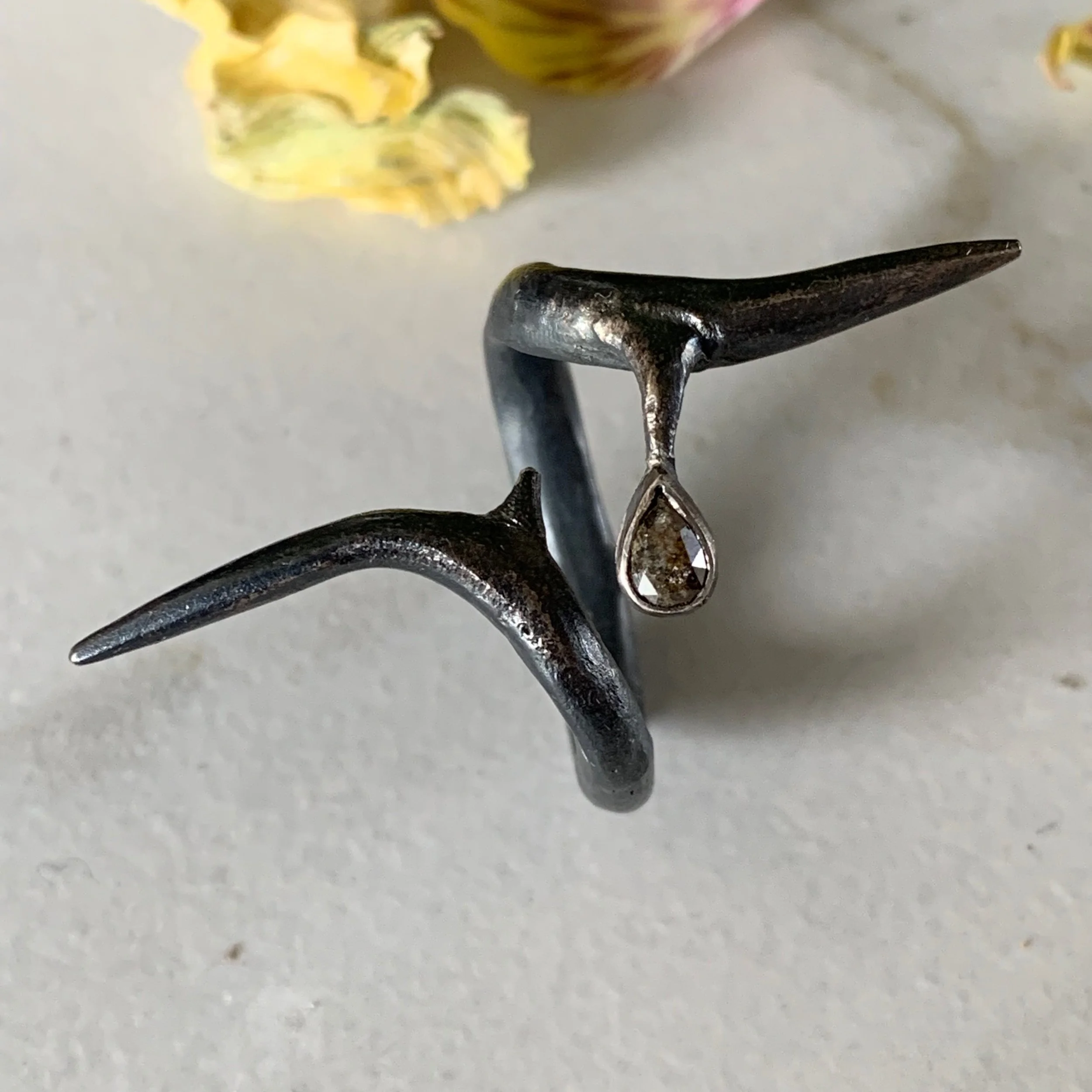 Twisted Thorn Ring with a Rose Cut Diamond Teardrop
