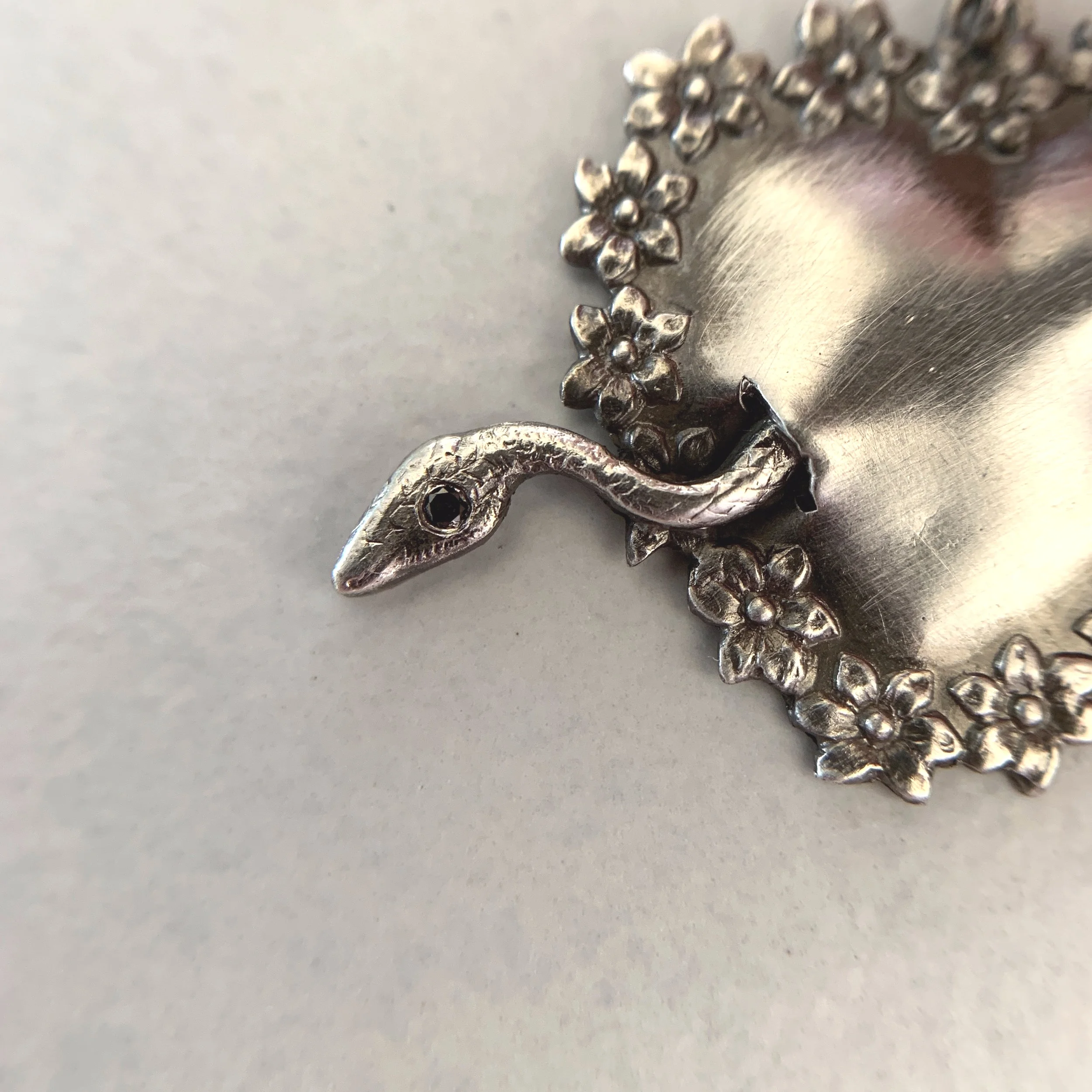 Victorian Floral Snake Heart Pendant in Oxidized Sterling Silver with a Black Diamond Eye by Beloved Little Lamb