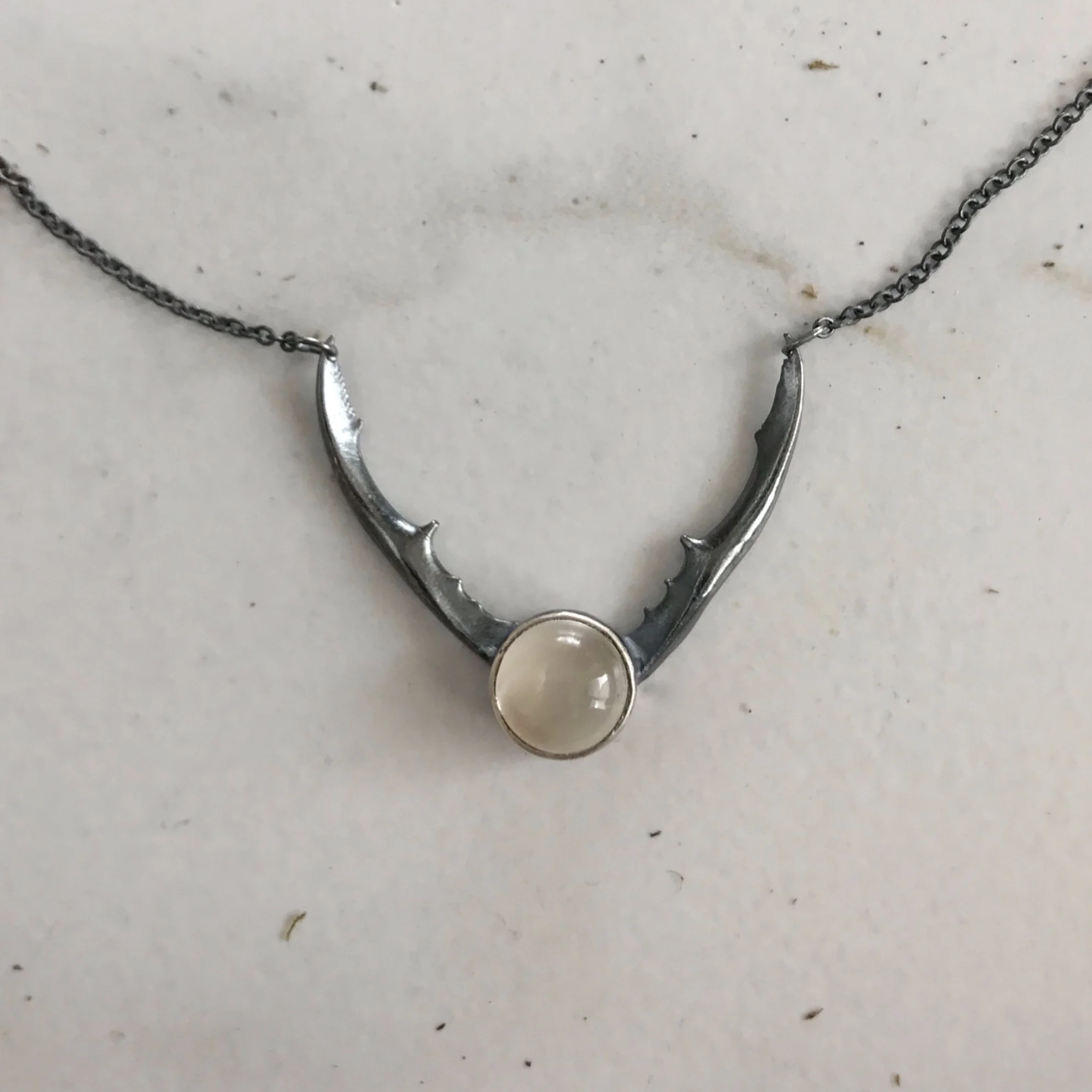 Horned Necklace with Bezel Set White Moonstone and Stag Beetle Horns