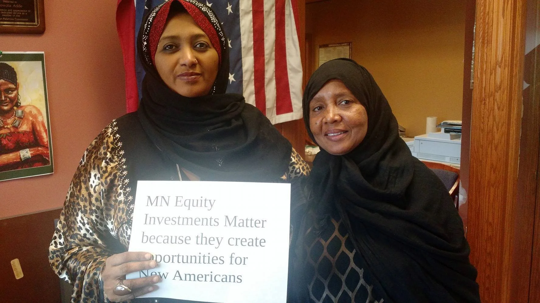 Immigrant Development Center Director Fowzia Adde with client