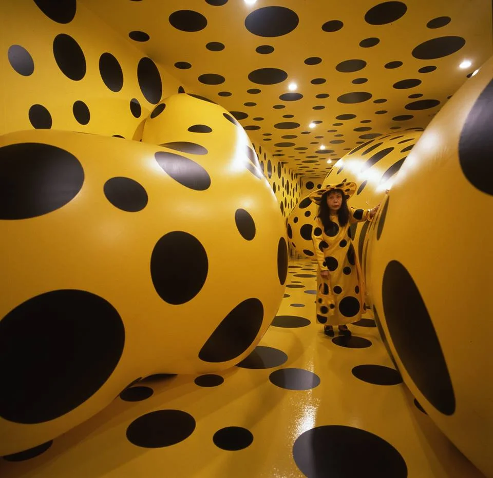 Yayoi Kusama with Dots Obsession , 1996