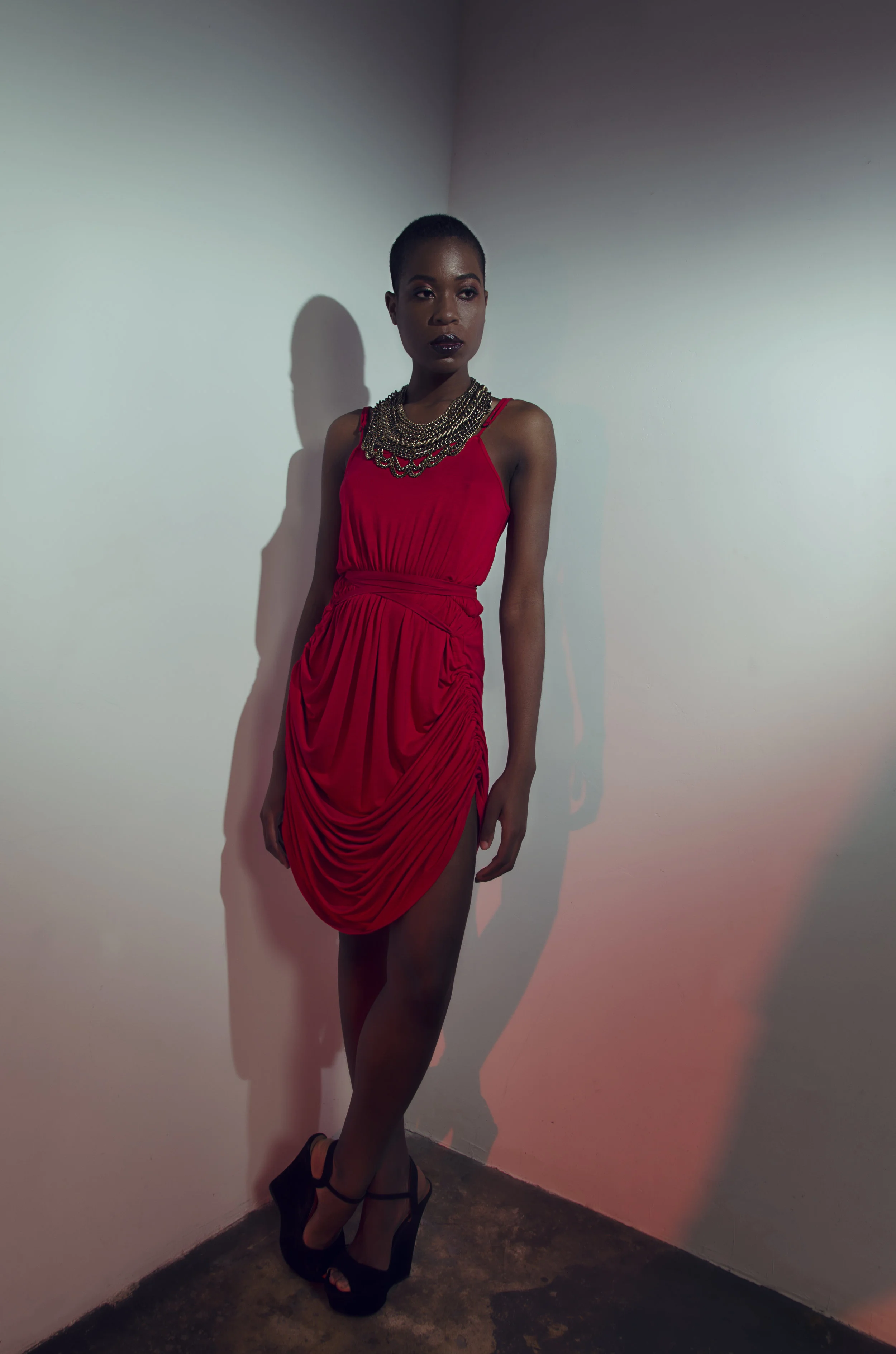 THE SAMANTHA DRESS in red The brands signature item that is versatile and can be worn as a maxi, midi or mini.