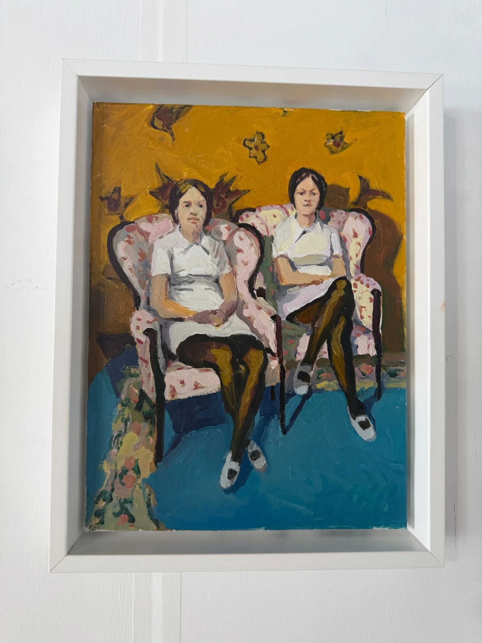 SEATED TWINS