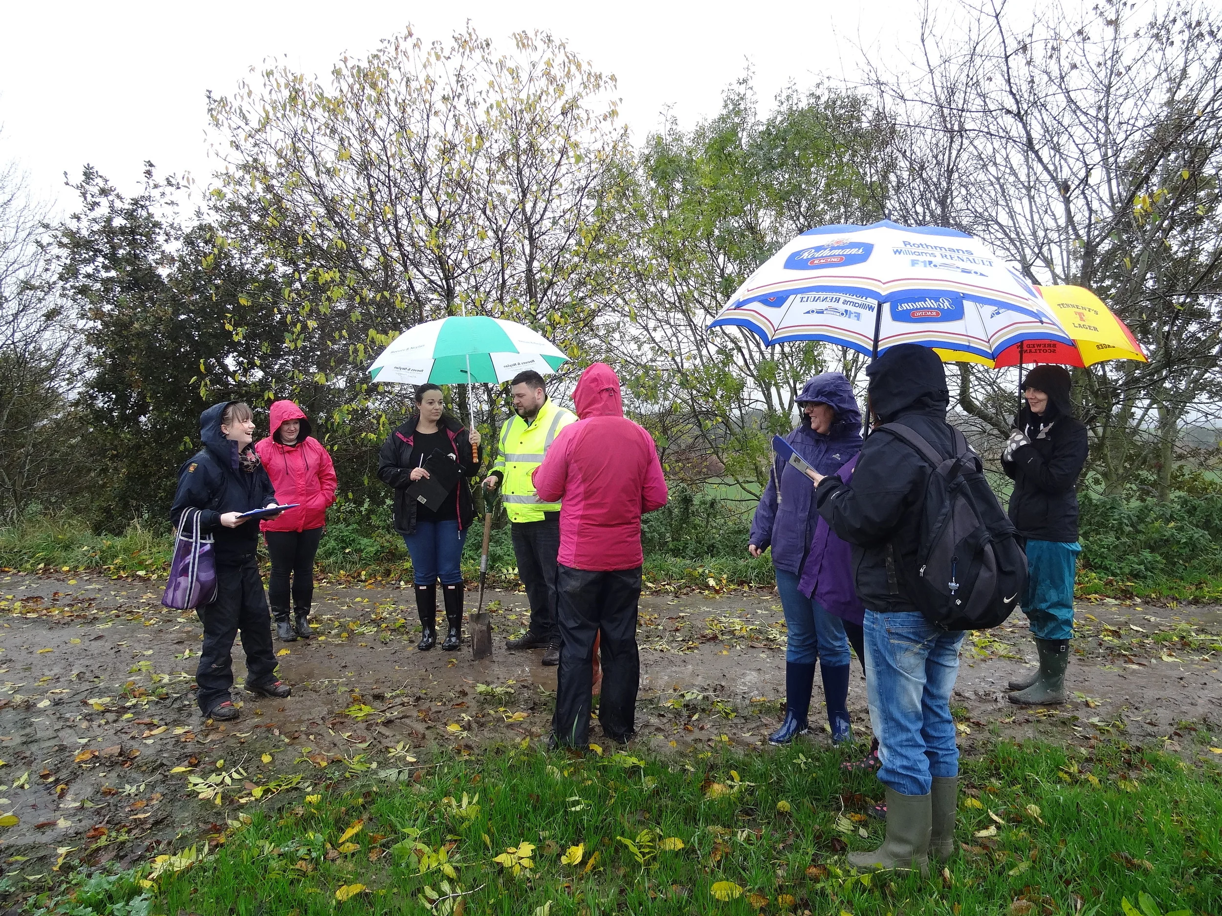 Even in pouring rain the teachers were enthusiastic about digging for worms
