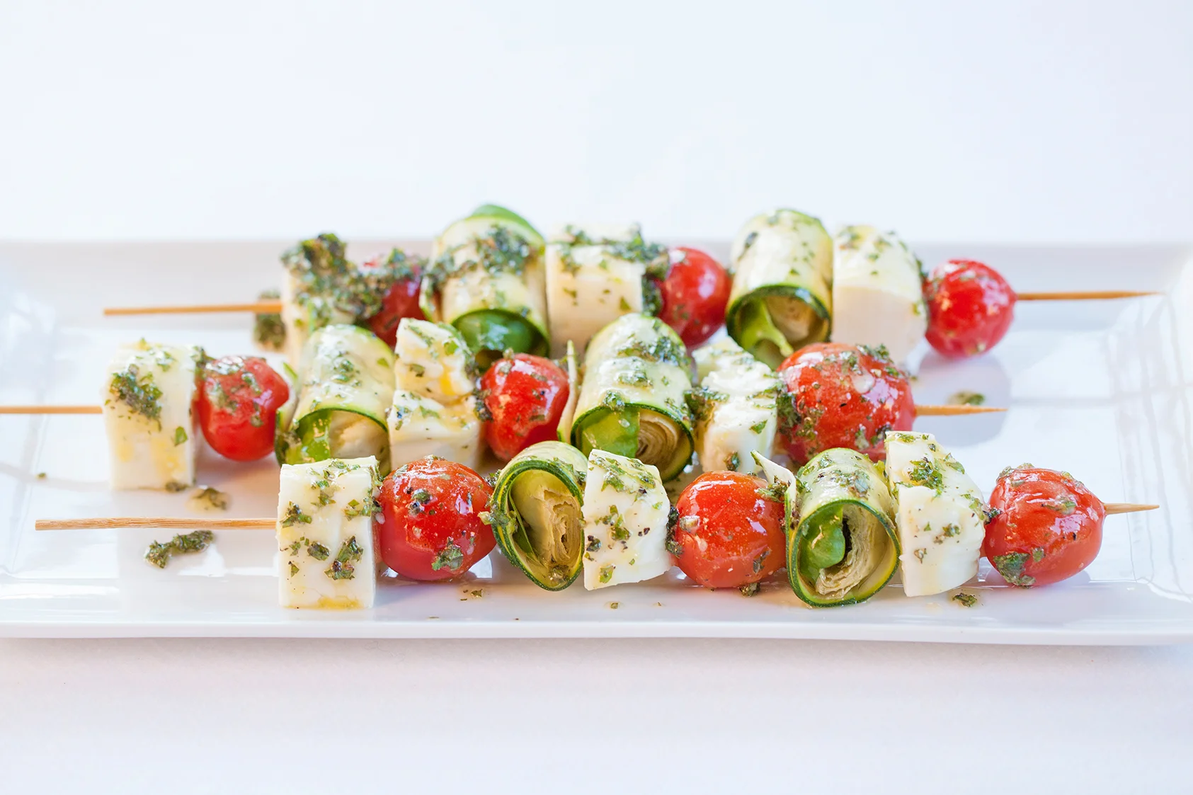 Raw, marinated Spiedini Vegetariani ready for cooking
