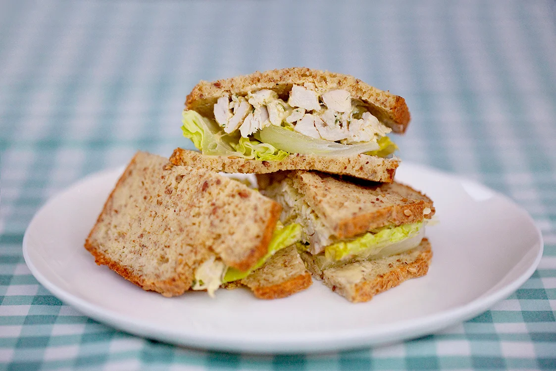 Cold roast chicken with tarragon mayonnaise and crispy lettuce between our Grain-Free Bread