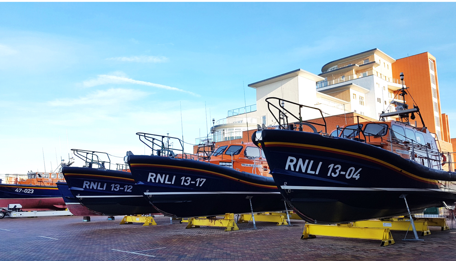Some lifeboats from the Royal National Lifeboat Institution.