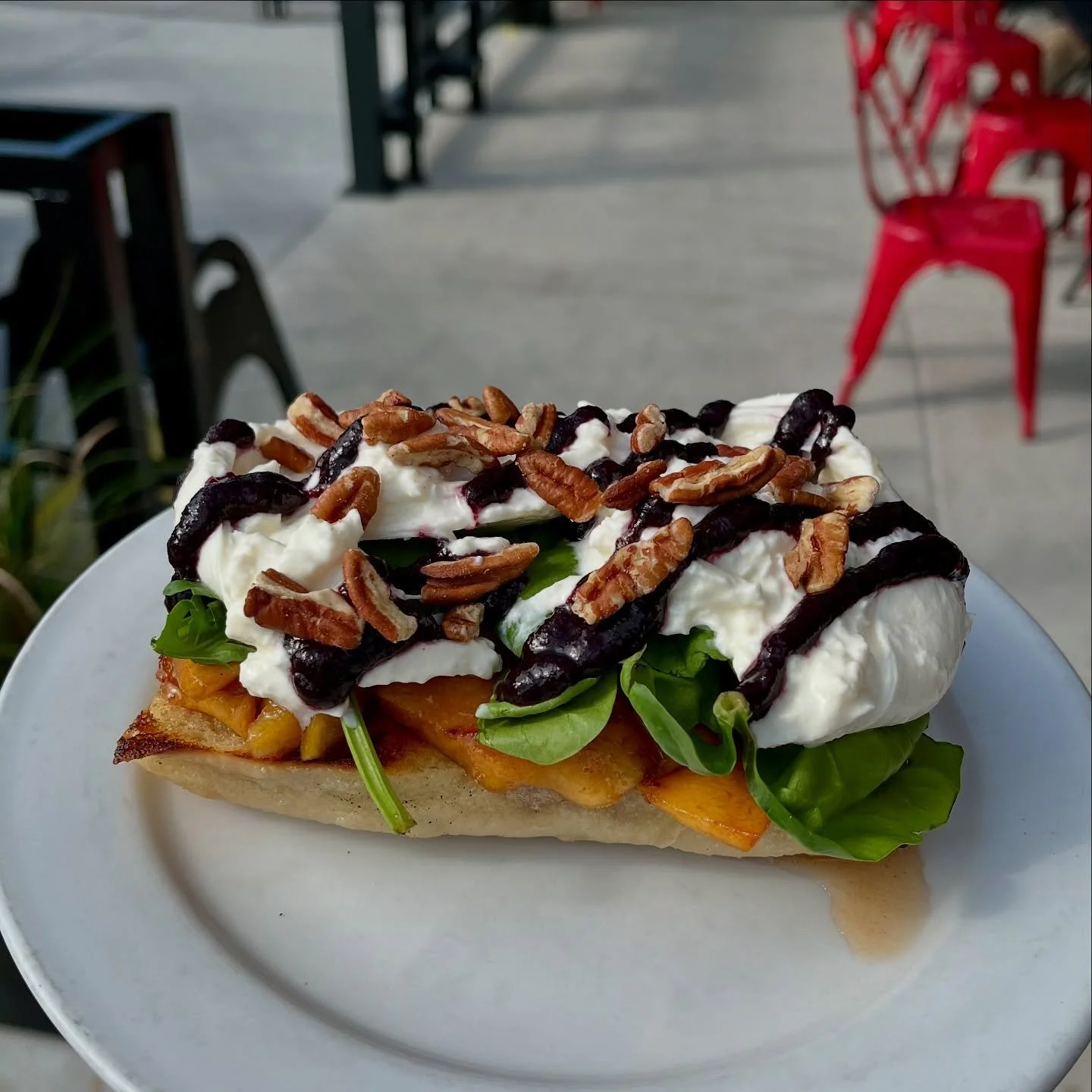 🍑New burrata!🫐 With roasted peaches, blueberry compote, pecans and spinach on house ciabatta toast &mdash; on our dinner menu, come through!