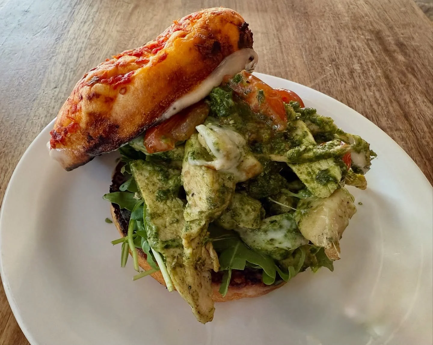 New sandwich!  Roasted chicken breast, charred cherry tomatoes, basil pesto, arugula, provolone cheese on sundried tomato focaccia.  Available day or night!