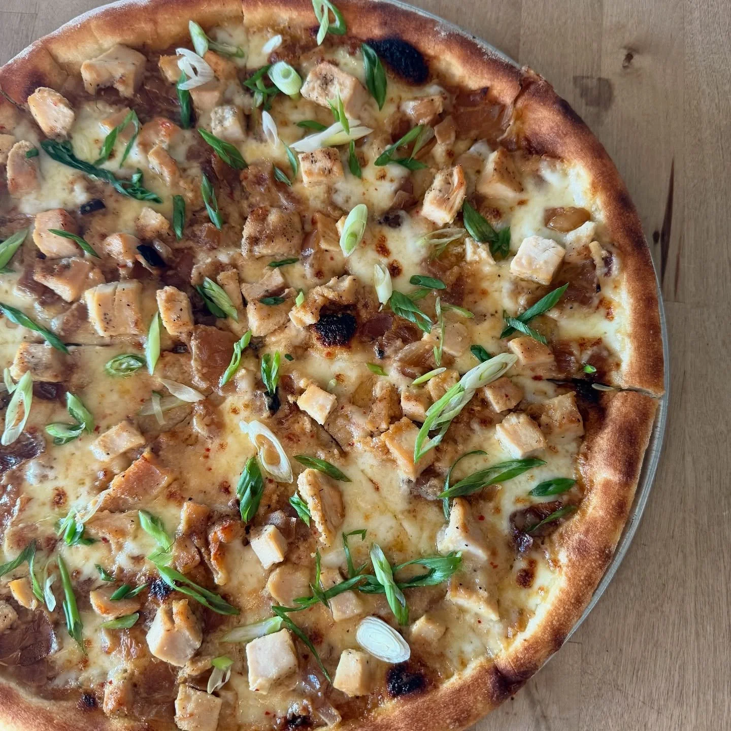 Back on the menu for November - it&rsquo;s the T.O.! Smoked chicken, spicy arbol peanut sauce, smoked onions, green onion, mozzarella.  Get it while the gettin&rsquo;s good 🔥