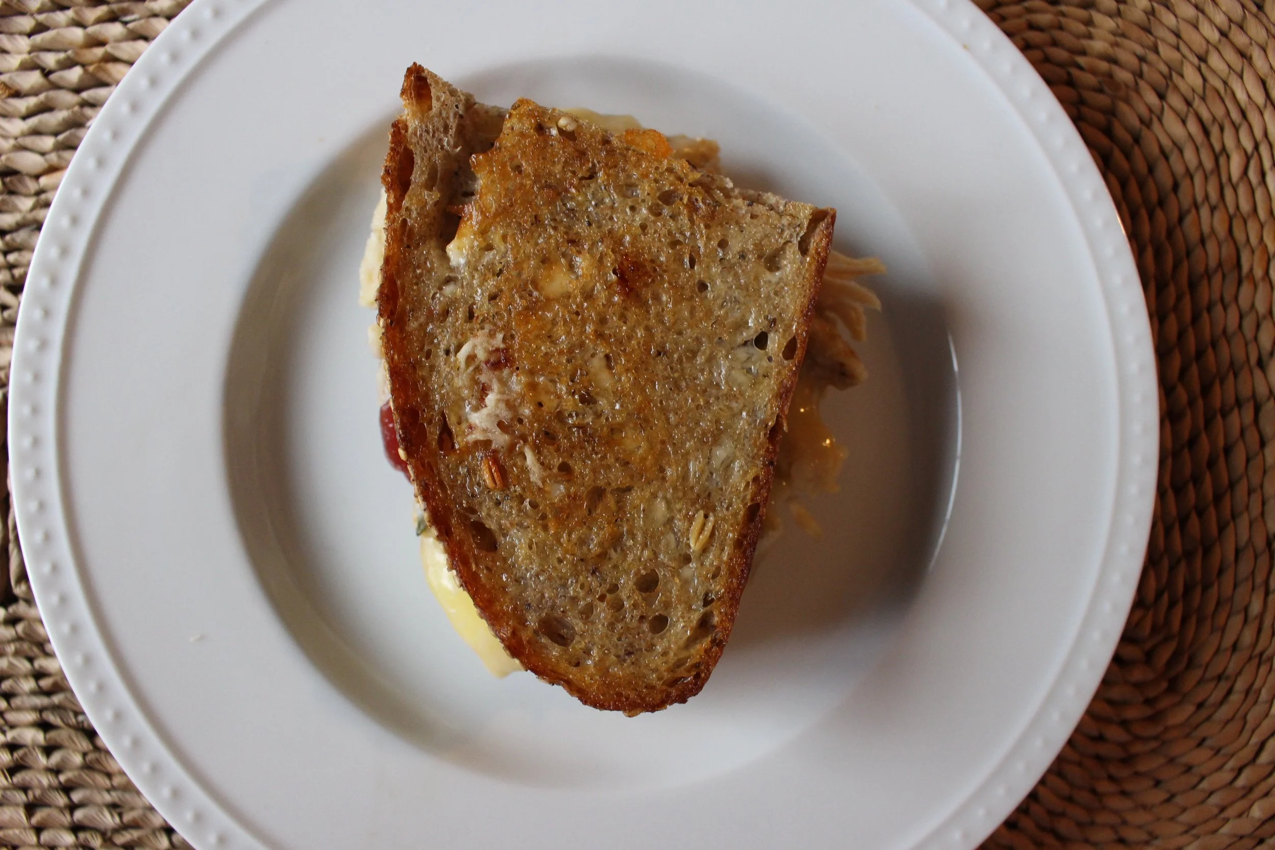 Thanksgiving leftovers grilled cheese | Me & The Moose. With this sandwich, you get all the Thanksgiving flavors with every bite and do very little work to make it happen. #meandthemoose #thanksgiving #leftovers #thanksgivingleftovers #thanksgivingleftoversandwich #moistmaker