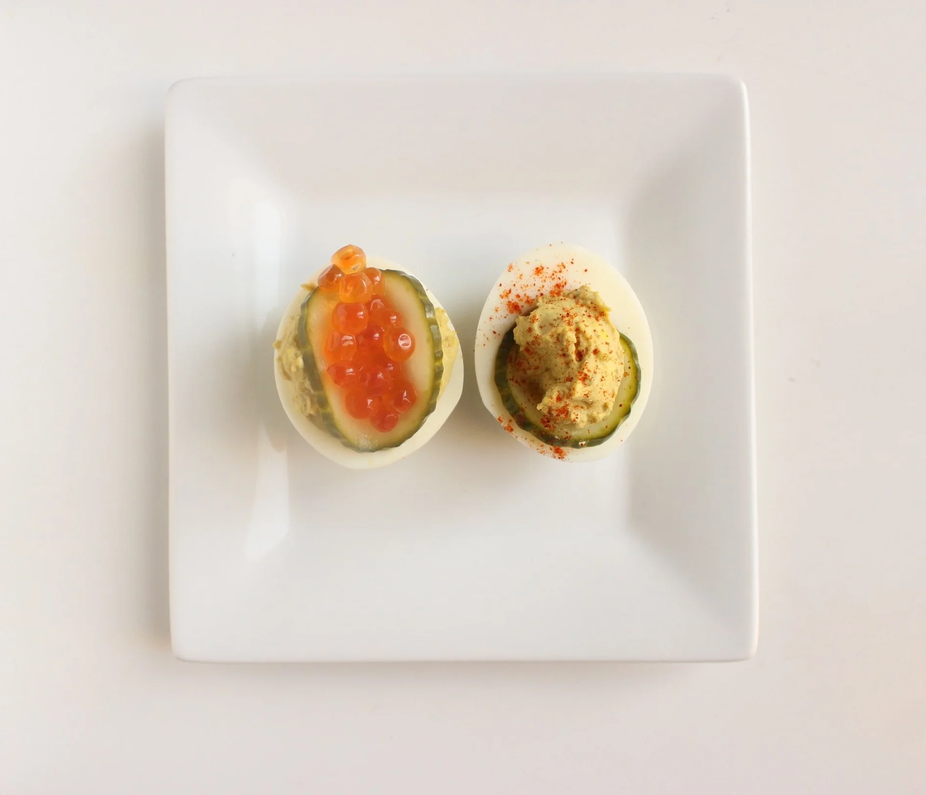 Deviled eggs | Me & The Moose. These deviled eggs provide a tasty hit of salt and protein to satisfy snack cravings. #meandthemoose #whole30 #whole30recipes #deviledeggs #snacks #snackrecipes