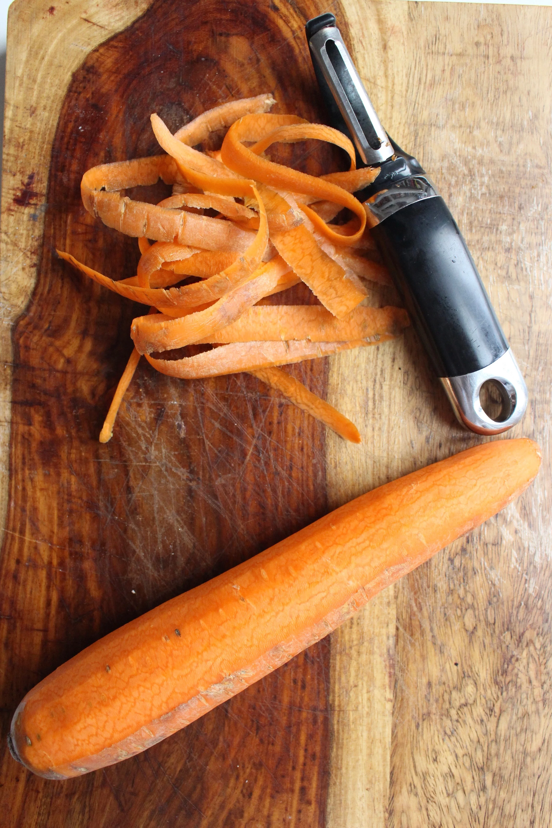 Roasted carrot hummus | Me & The Moose. Roasted carrots sweeten up this spicy, complex, EASY hummus. #meandthemoose #snackrecipes #hiddenveggies #snacks #roastedcarrots #hummus #homemadehummus #hummusrecipes