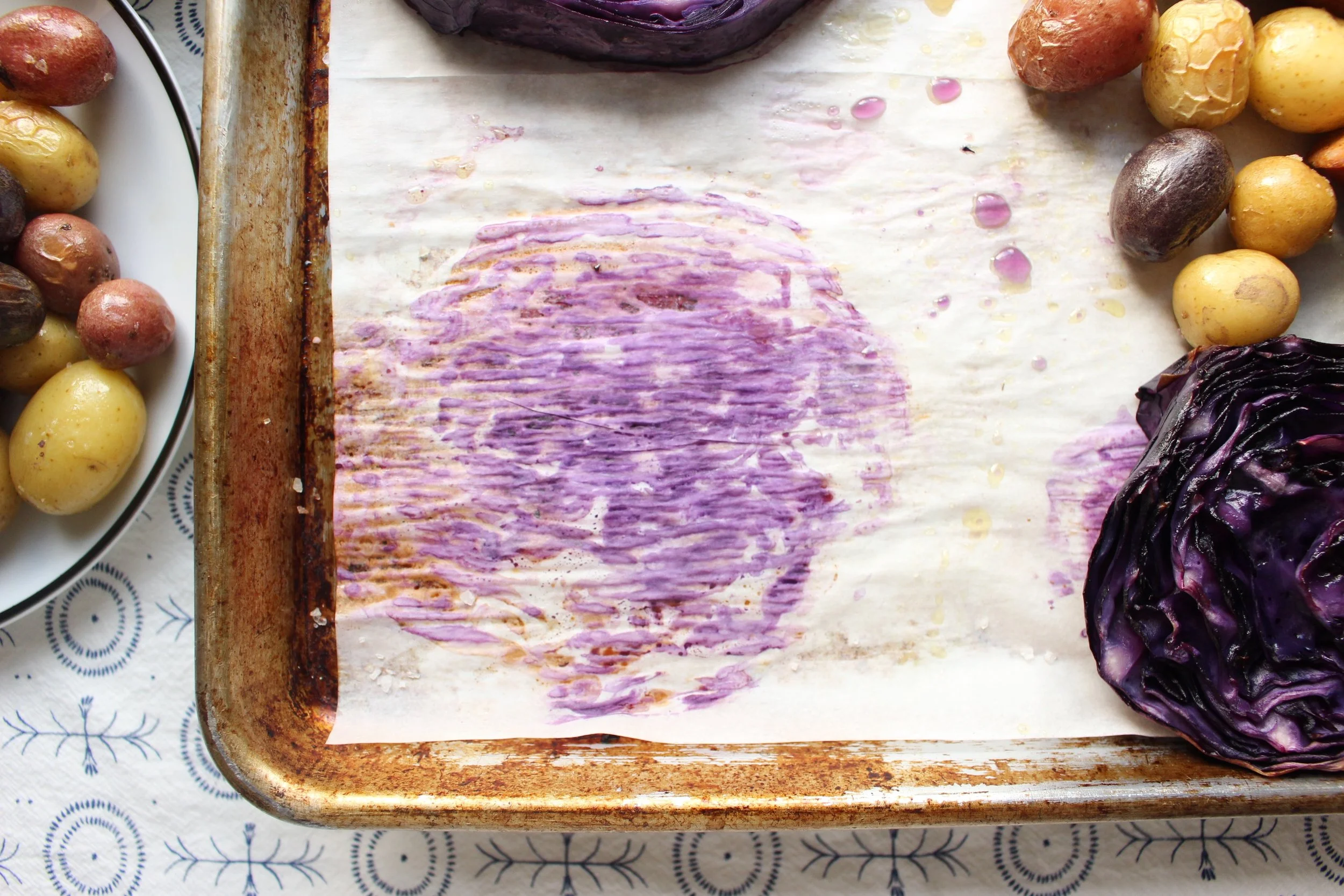 Purple cabbage is magical. Look at that purple! #meandthemoose #sheetpandinner #purplecabbage #potatoes #sausage #Oktoberfest