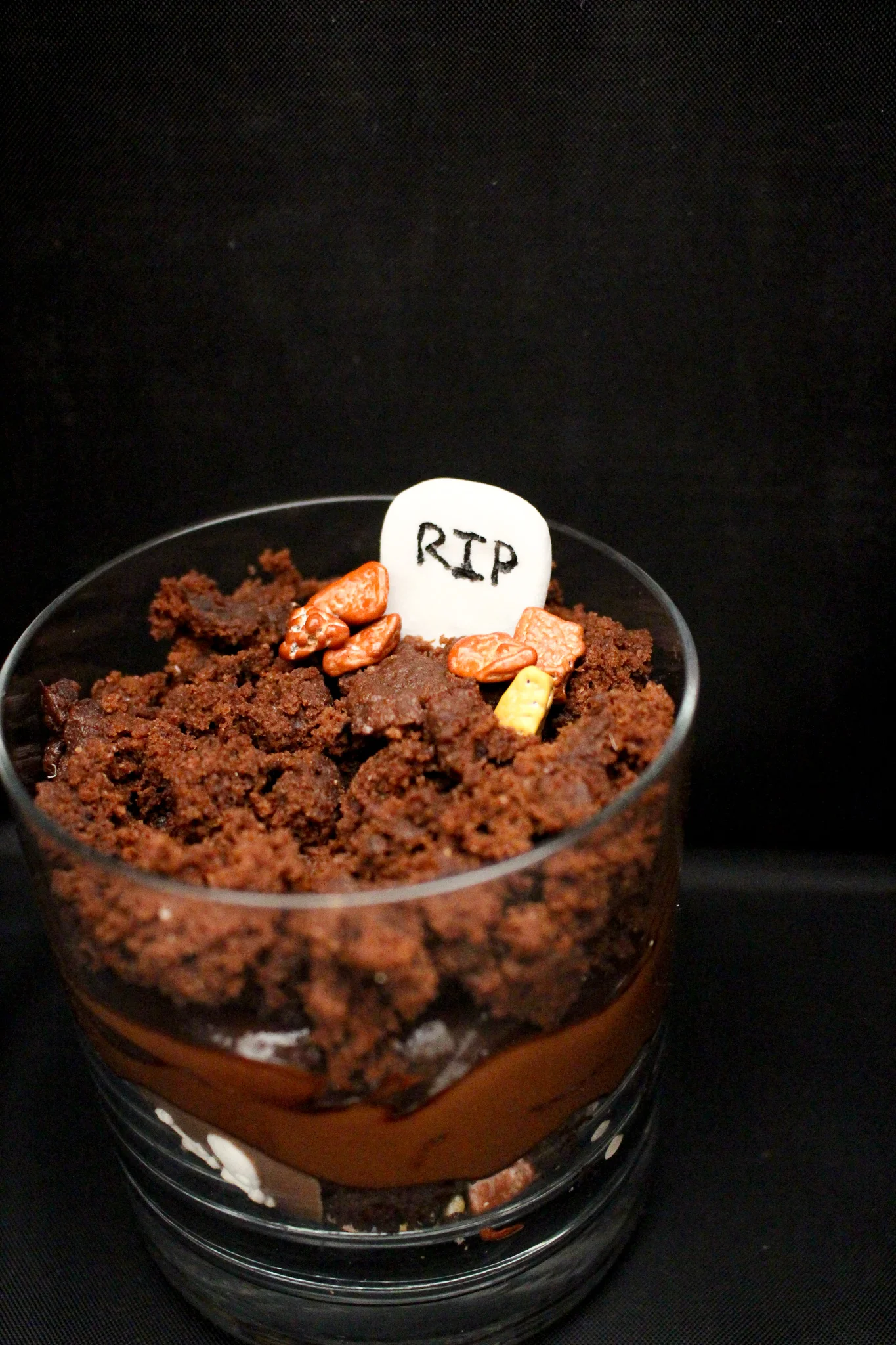 Seed butter graveyards | Me & The Moose. Chocolate mug cake, avocado chocolate pudding, and some store-bought candies make an easy, festive Halloween treat. #meandthemoose #halloween #veganoption #glutenfreeoption #dairyfreeoption #nutfreeoption #graveyards #wormsanddirt