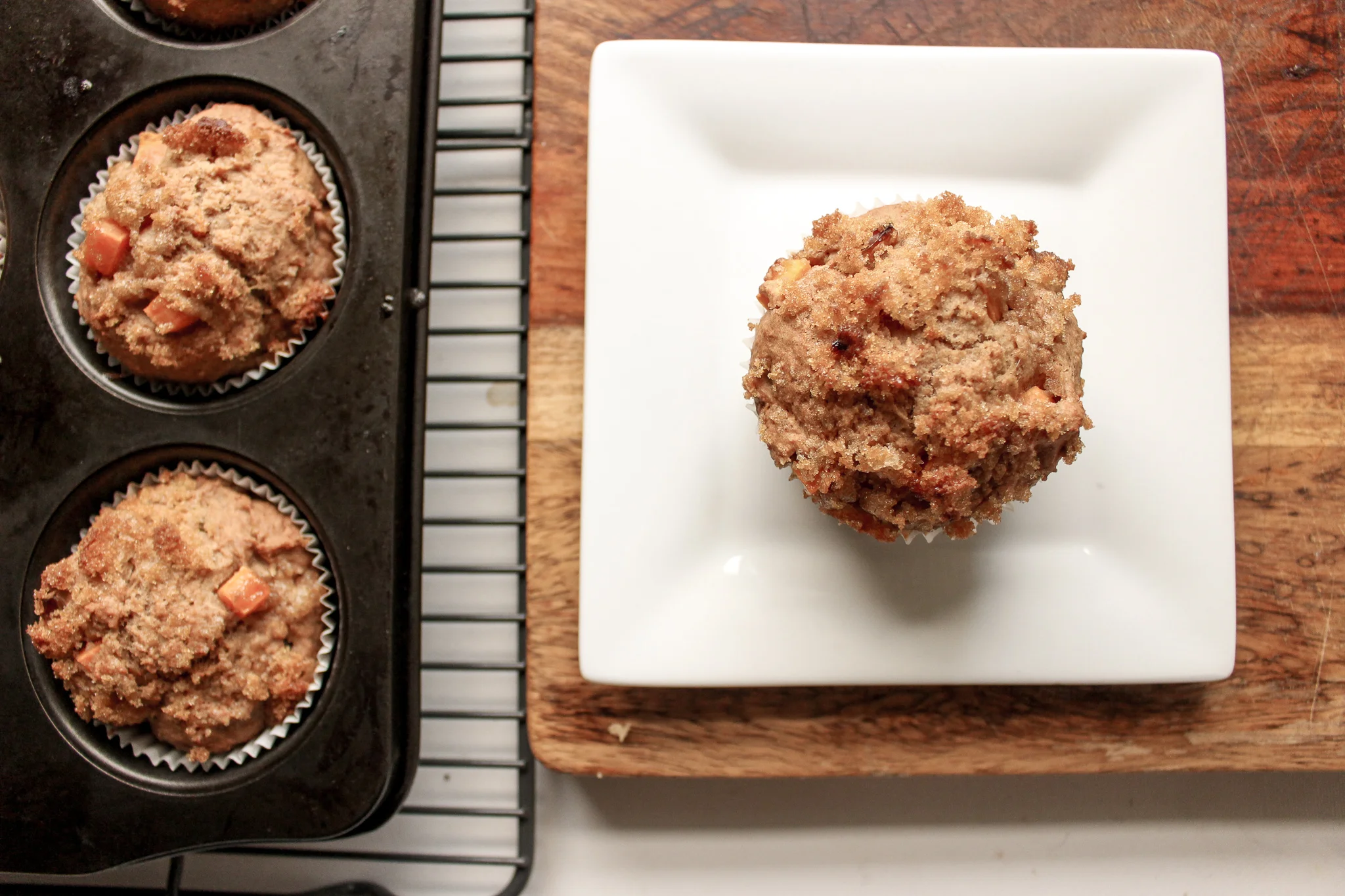 Sweet potato muffins | Me & The Moose. These one-bowl, whole grain muffins sneak in some vegetables at breakfast, lunch, or snack time. #sweetpotatomuffins #meandthemoose #sweet potatorecipes #thanksgiving #healthybaking