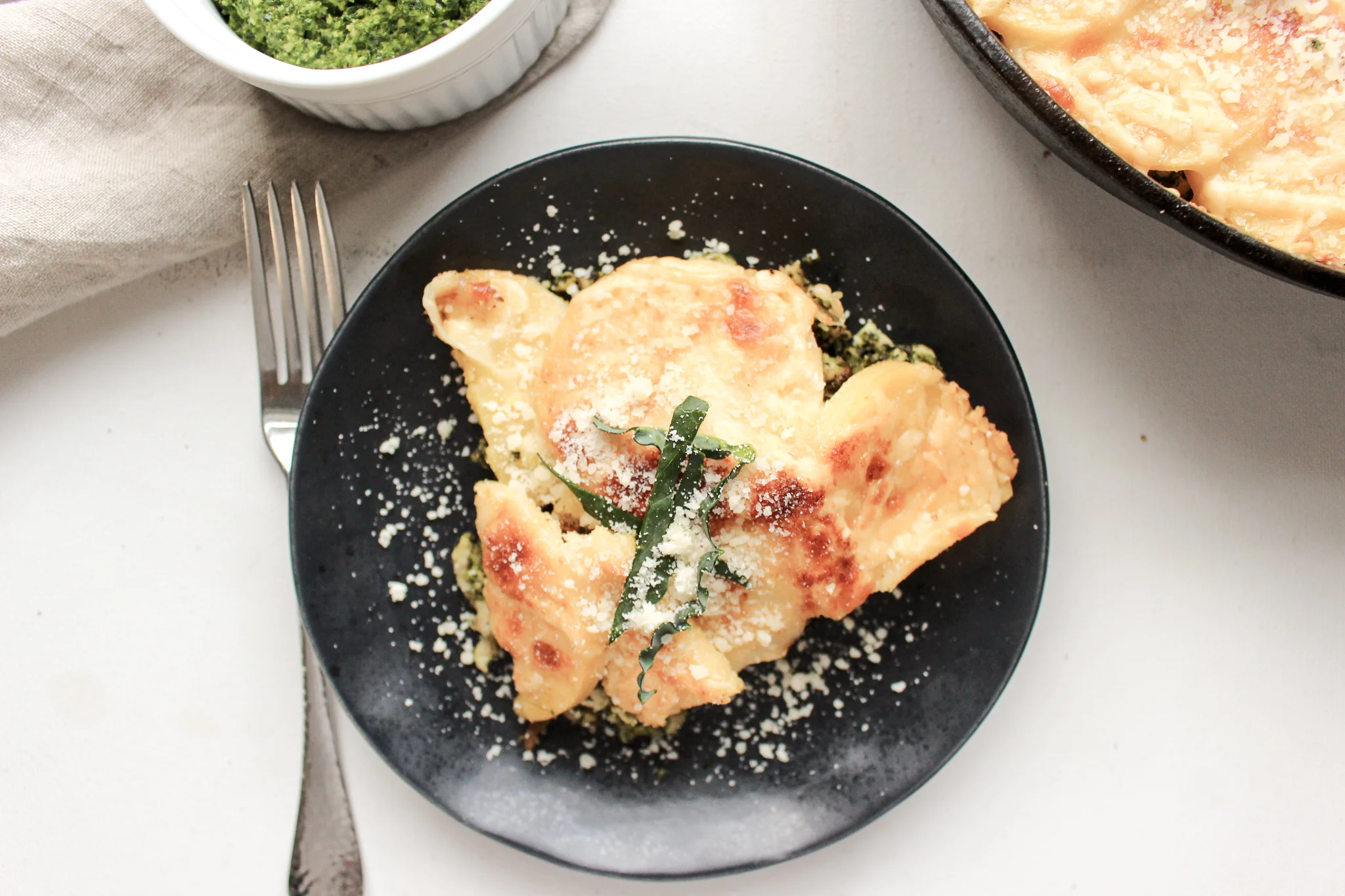 Polenta, turkey, and kale casserole | Me & The Moose. This casserole requires one oven-safe pan, a few simple ingredients, and is an easy, fast, healthy, and delicious meal for any busy night. #meandthemoose #kalerecipes #polentarecipes #kalepesto #dinnerrecipes #onepotcooking #fastdinnerrecipes #casseroles
