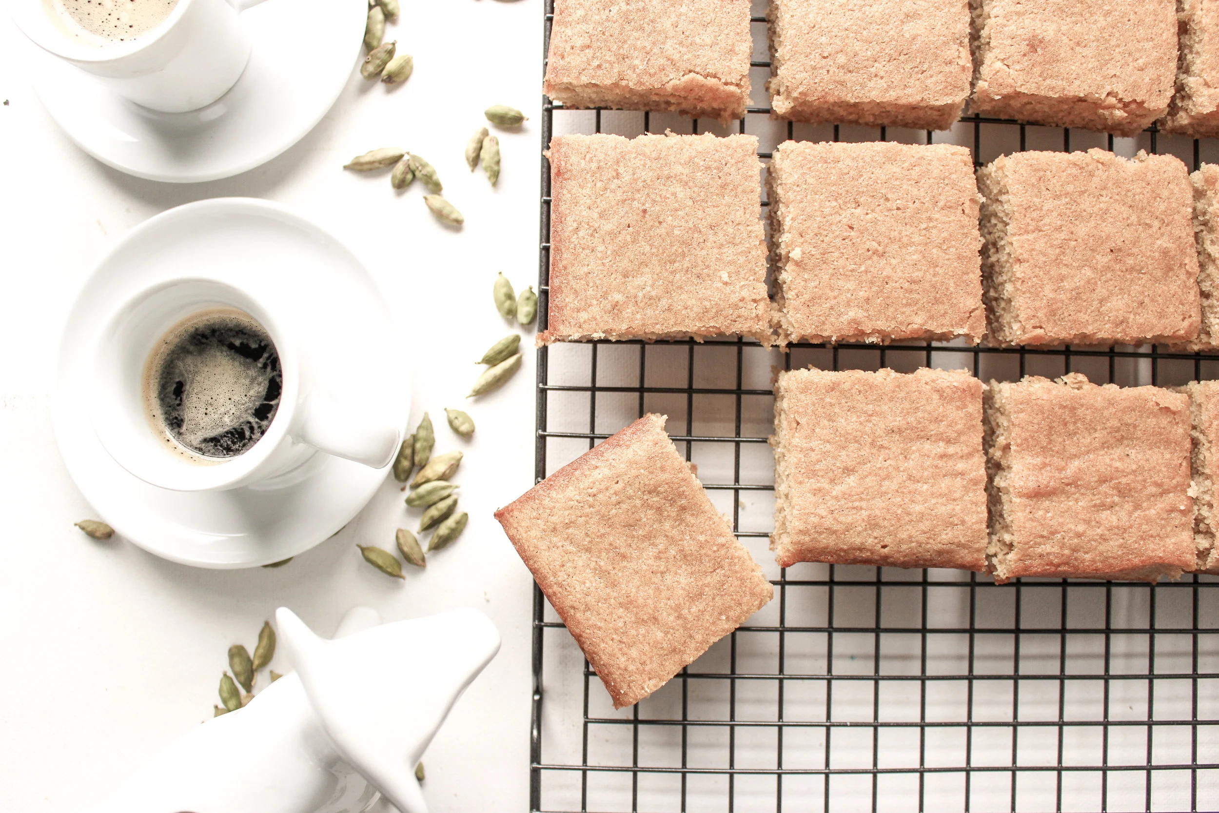 Coffee and cardamom blondies | Me & The Moose. These bar cookies are spiced, sweet, and dense, require one bowl, and are great for a crowd. #meandthemoose #blondies #coffee #cardamom #batchbaking #Christmasbaking #uniquedesserts #easydessertrecipes