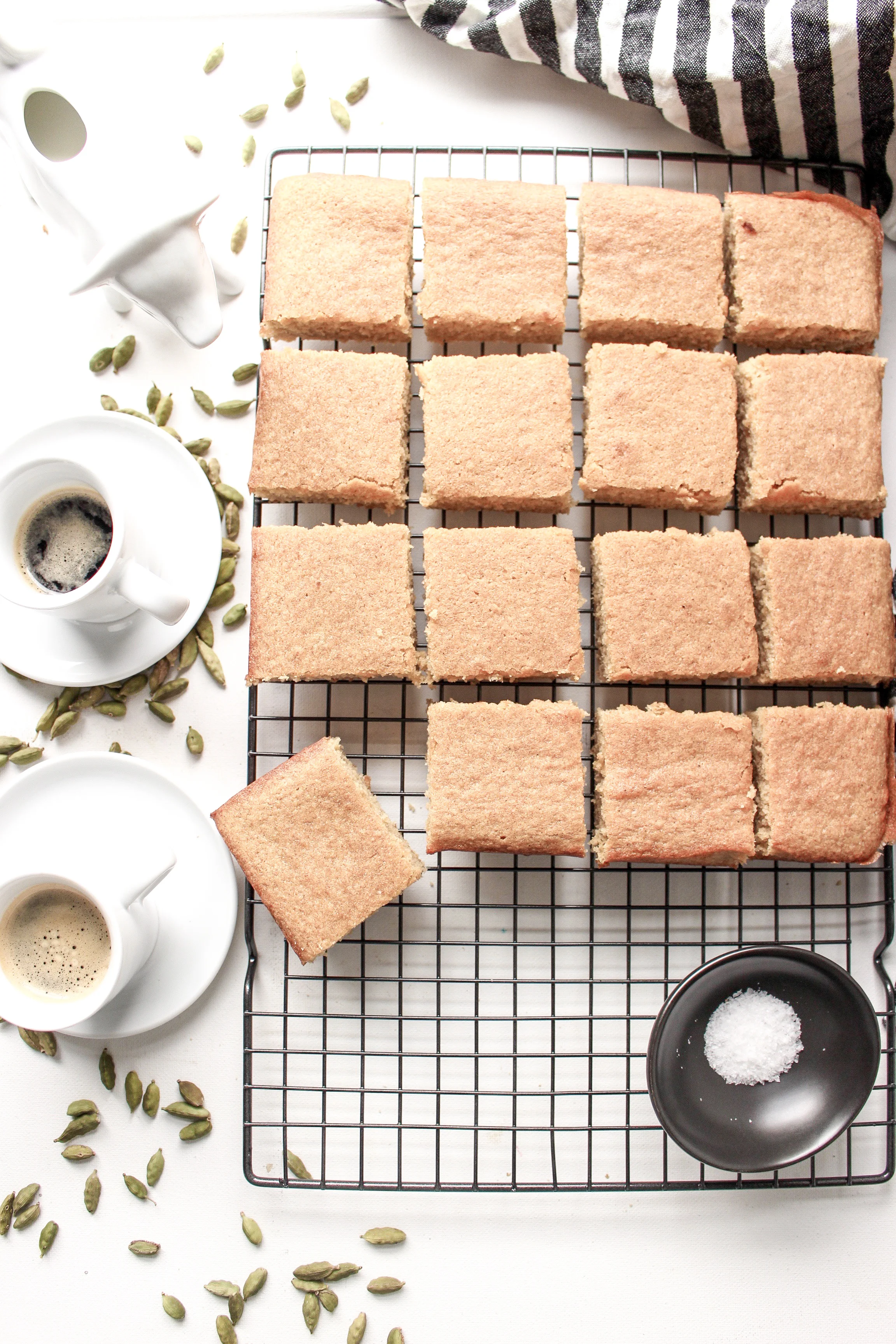 Coffee and cardamom blondies | Me & The Moose. These bar cookies are spiced, sweet, and dense, require one bowl, and are great for a crowd. #meandthemoose #blondies #coffee #cardamom #batchbaking #Christmasbaking #uniquedesserts #easydessertrecipes
