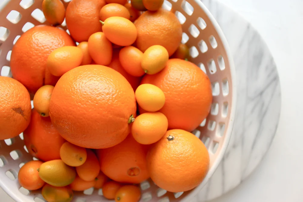 Orange and almond upside down cake | Me & the Moose. Cara cara oranges, clementines, and kumquats baked in a light syrup really shine in this simple, lightly sweet, and naturally gluten-free upside down cake. #meandthemoose #citruscake #citrusrecipes #healthybaking #oranges #almonds #glutenfreerecipes #glutenfree #upsidedowncake