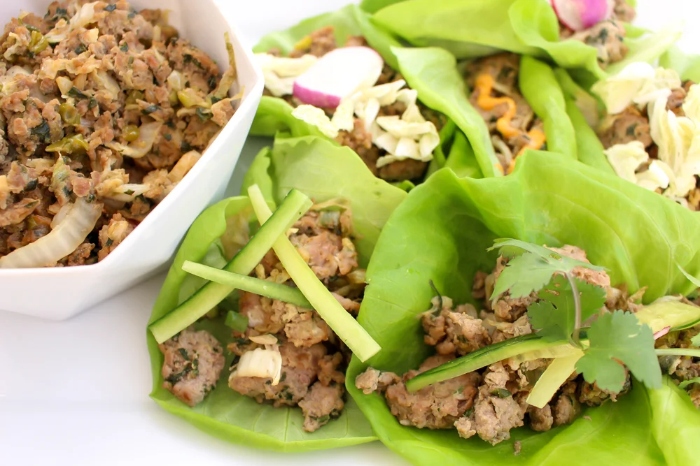 Dumpling lettuce wraps | Me & The Moose. This dish is so simple, is ready in under 30 minutes, and will make everyone at your table happy one way or another. #meandthemoose #dinner #thirtyminutemeals #easydinner #dinnerrecipes #dumplings #pork
