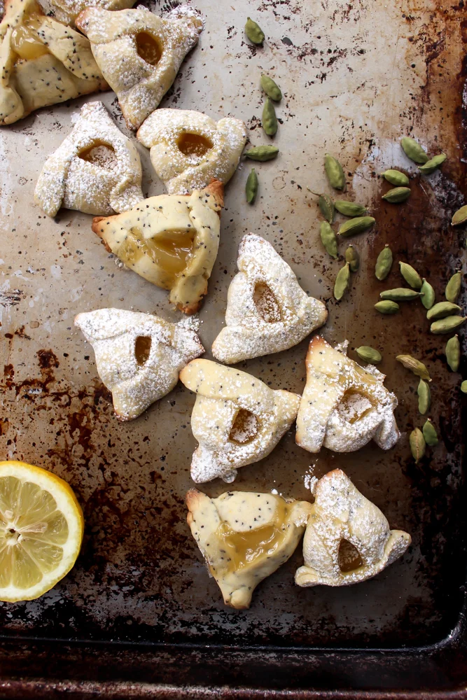 Lemon poppyseed hamantaschen | Me &amp; The Moose. These hamantaschen are a twist on a classic and a quick-cooking spring-y cookie. #meandthemoose #hamantaschen #lemonpoppyseed #cookies #cookierecipes #purim #Jewishrecipes #baking #easybaking