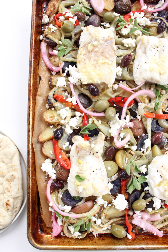 Sheet pan dinner: White Fish with Potatoes and Fennel | Me & The Moose. This one pan wonder dinner is ready in 40 minutes and features fish and veggies dressed up with all the sweet, salty, creamy, briny, and crunchy toppings you could want. #meandthemoose #sheetpandinner #onepandinner #dinnerrecipes #Mediterraneandiet #fishrecipes #pescatarianrecipes #glutenfreerecipes #dairyfreerecipes