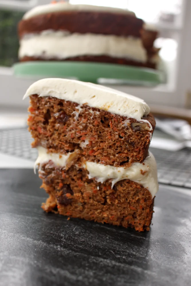 Healthier apricot carrot cake | Me & The Moose. This healthier carrot cake uses no refined sugar, reduces the fat, and increases the veggies to make a cake that is equally light and delicious. #meandthemoose #carrotcakerecipes #carrotcake #healthybaking #healthybakingrecipes #healthyrecipes #healthycake #cake #cakerecipes