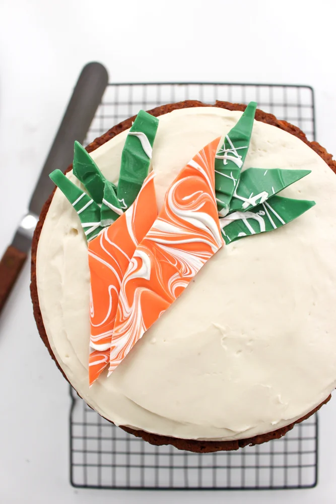 Healthier apricot carrot cake | Me & The Moose. This healthier carrot cake uses no refined sugar, reduces the fat, and increases the veggies to make a cake that is equally light and delicious. #meandthemoose #carrotcakerecipes #carrotcake #healthybaking #healthybakingrecipes #healthyrecipes #healthycake #cake #cakerecipes