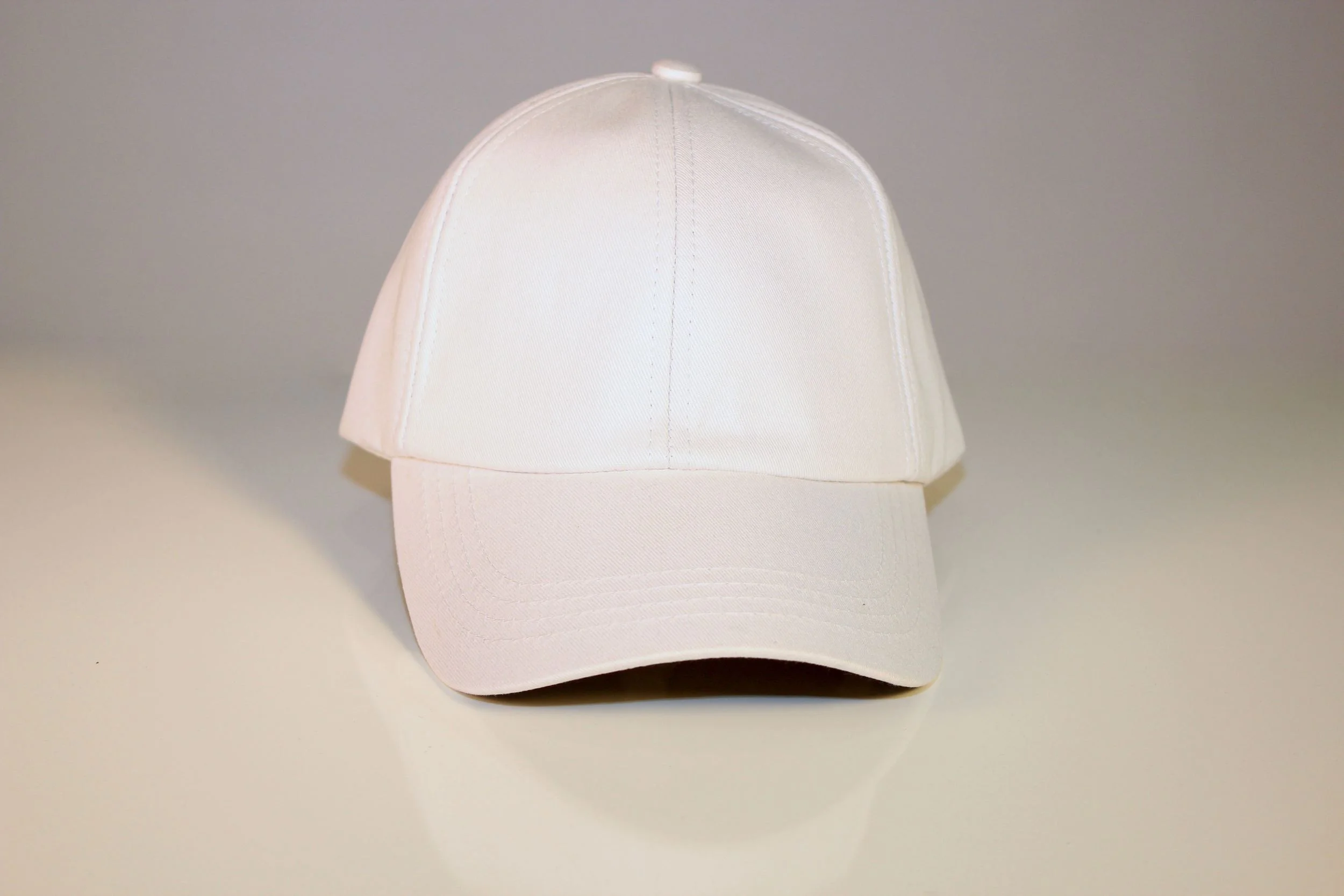 solid white baseball cap
