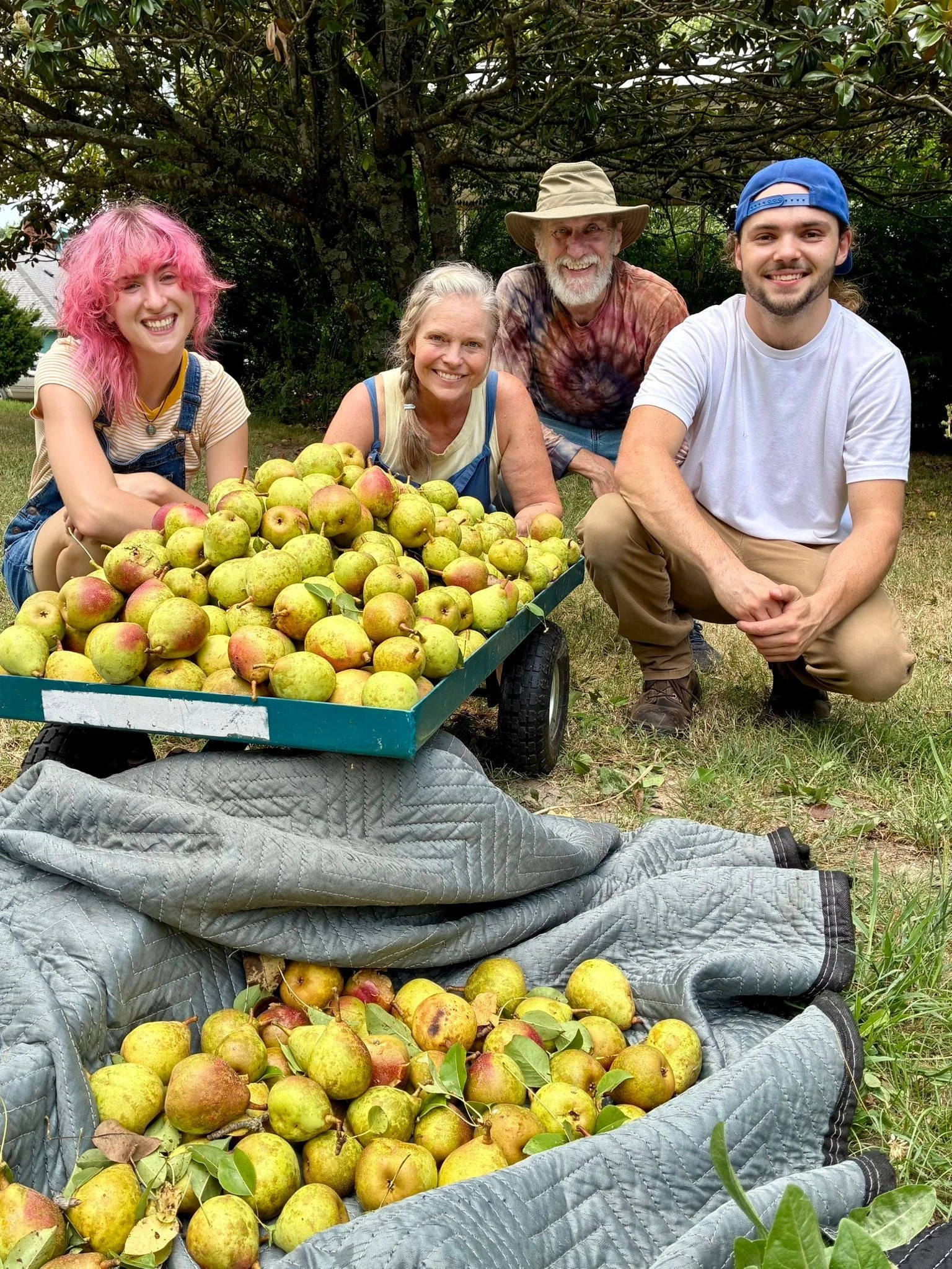 A beautiful day with some friends in the Sanctuary! Delicious pears and lots of laughter and we gratefully welcomed the evening rainstorm after weeks of searing heat and drought. 

We love having volunteers come help and enjoy the bounty of the land!