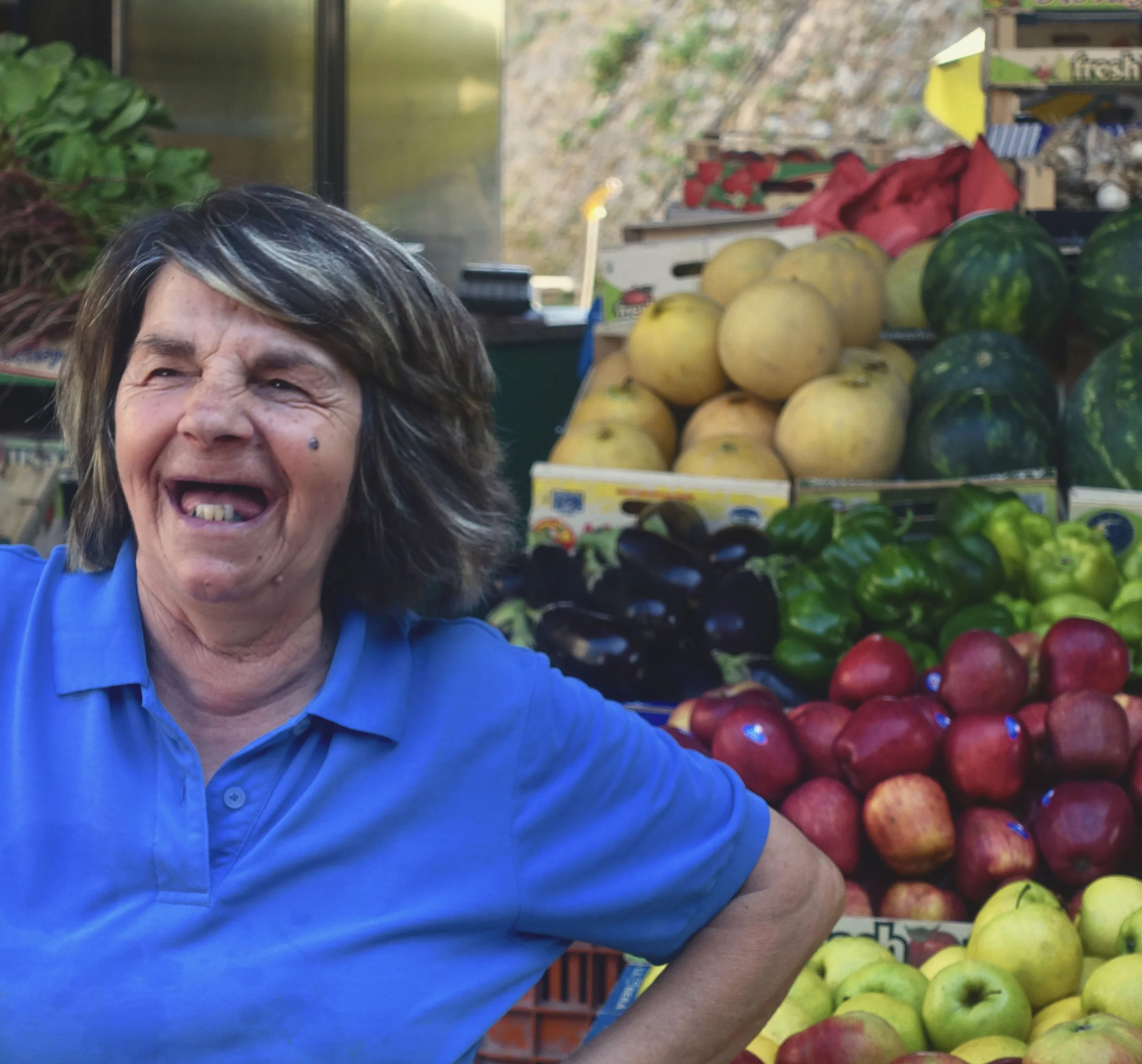  Lady selling vegetables in the Corfu market 
