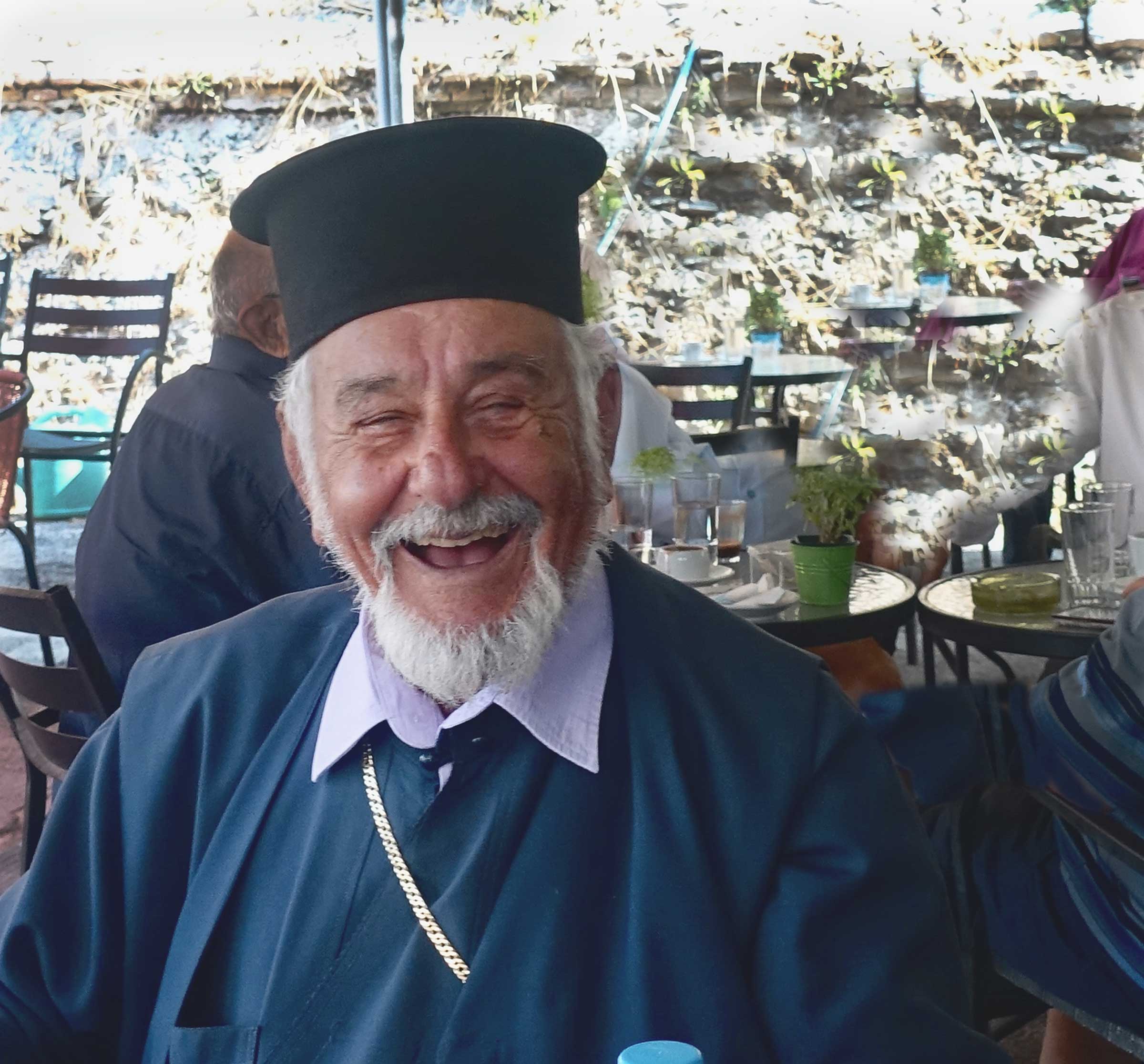  Priest says hi in the Corfu market 