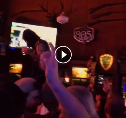 Ape on bar.