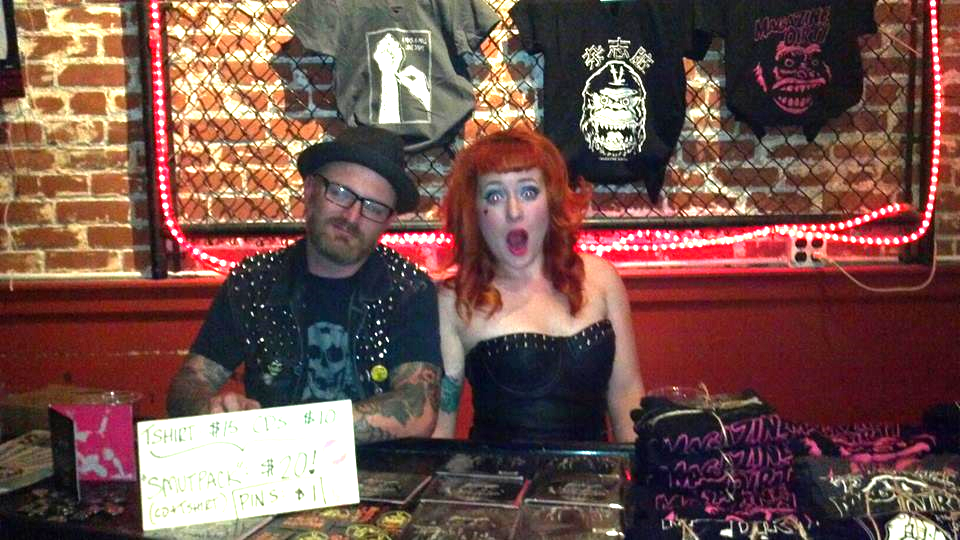 Selling merch with my love, Reid, ( aka Dr. Cain) after a SLO Brew set.