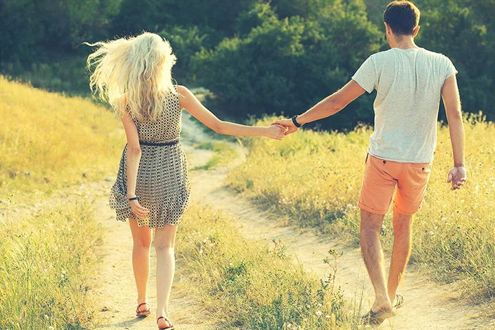 stock-photo-young-couple-in-love-together-on-nature-in-summer-210820717.jpg