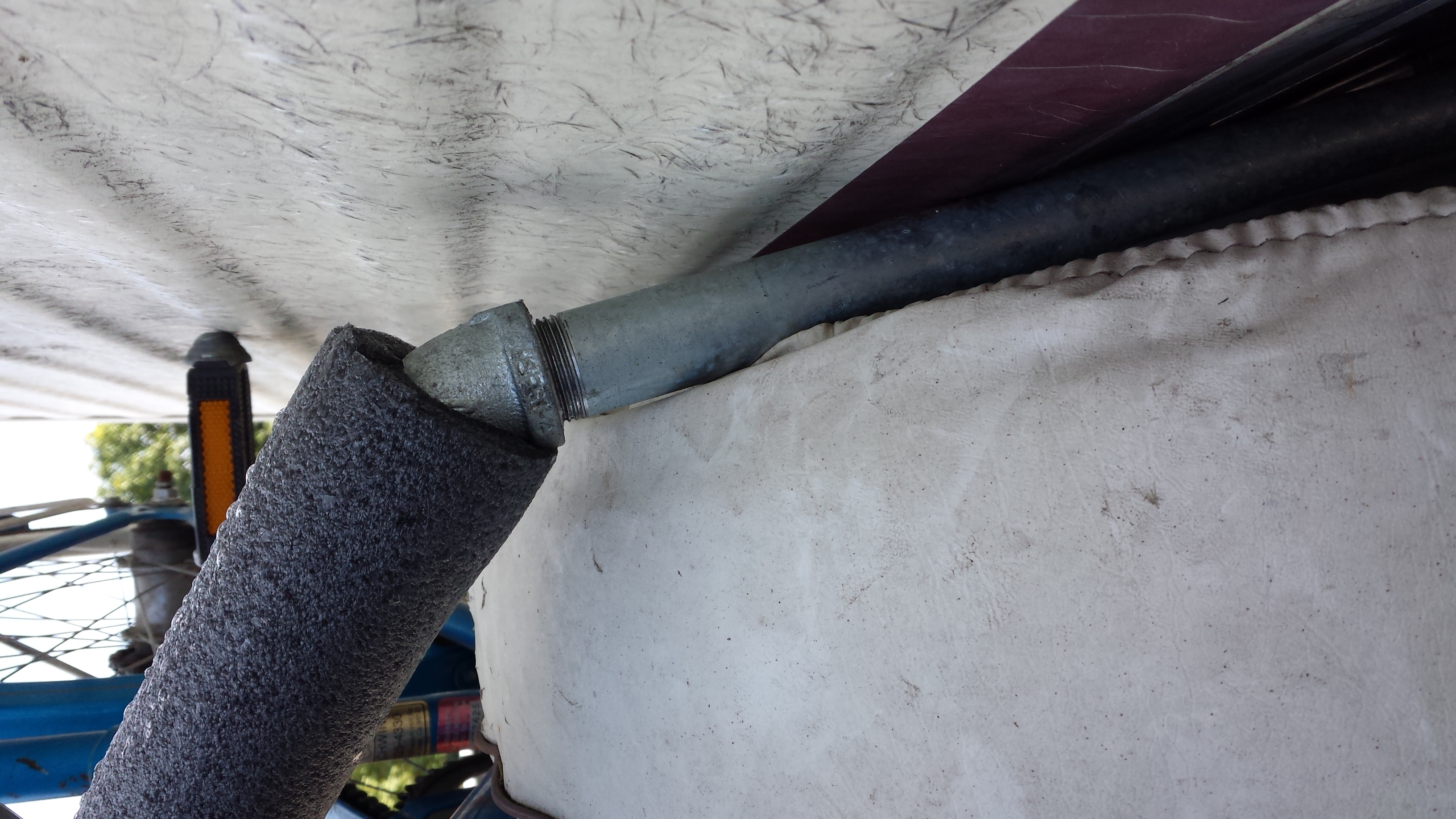 Could improve this rack by adding a length of shim between the RV and pipe connection points. 