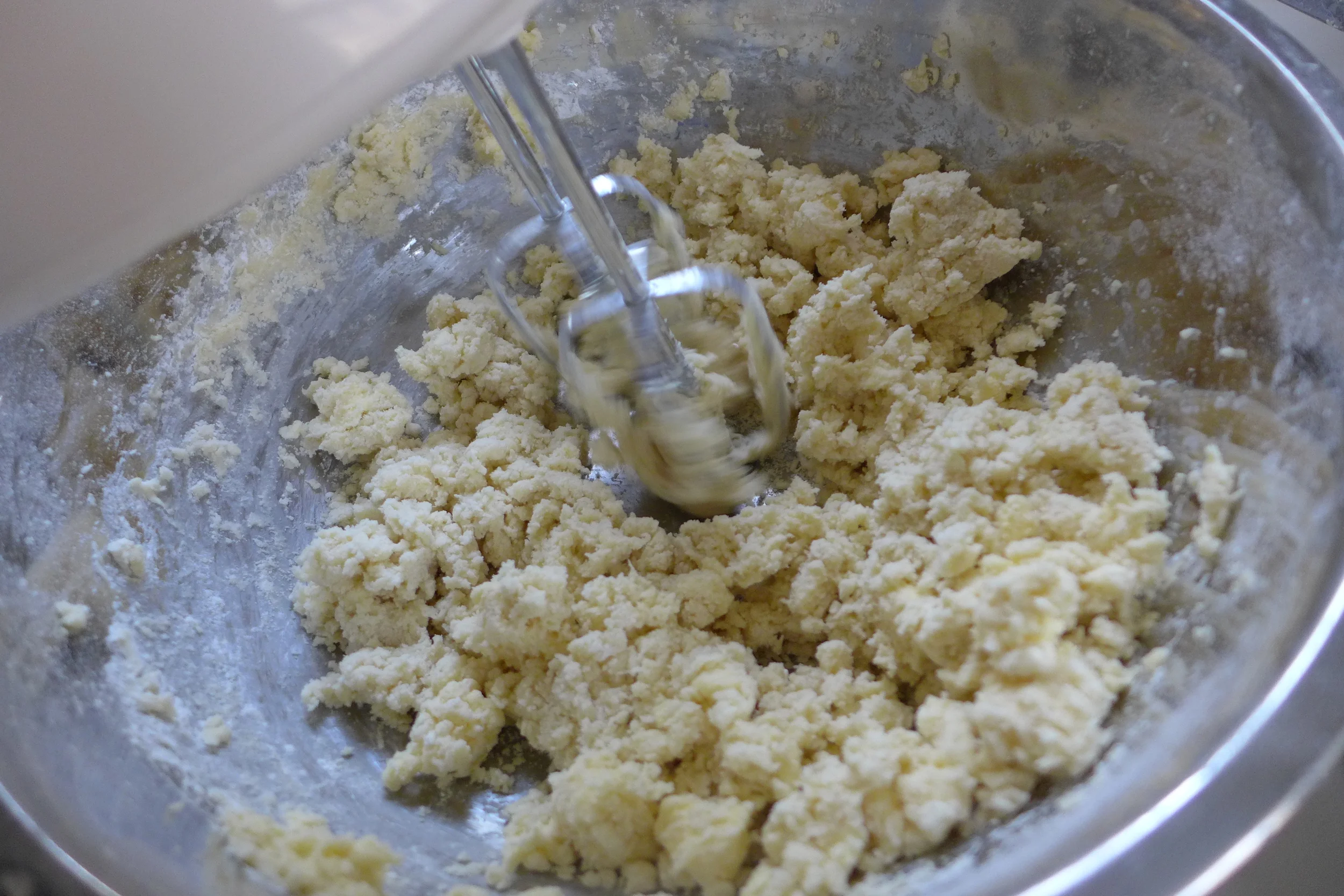 The butter and sugar continue to come together more and more