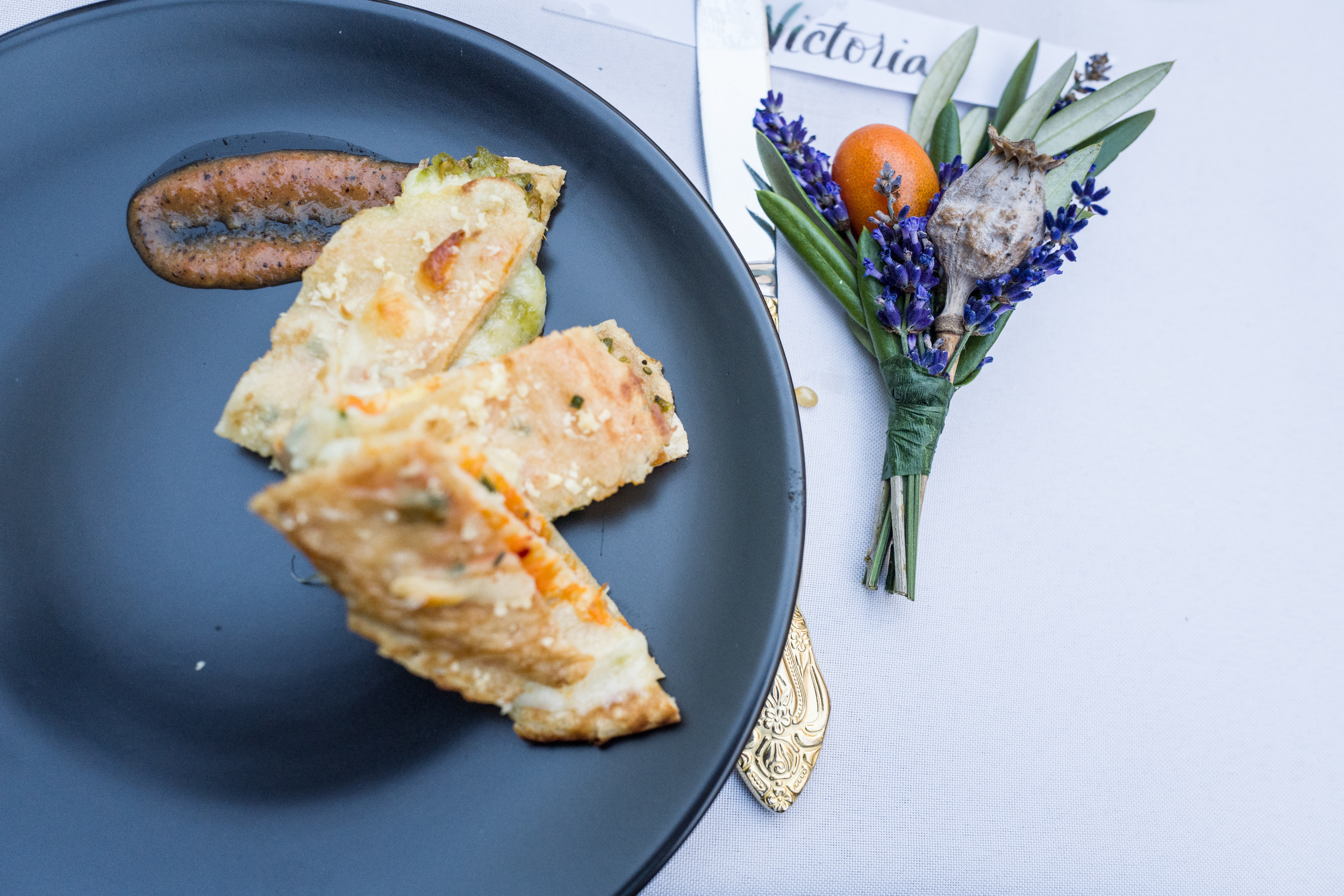 Layers of corn tortilla, mashed yam, whole wheat crepe, anaheim chili puree, and soft+ hard cheeses. Photo by Victoria Smith