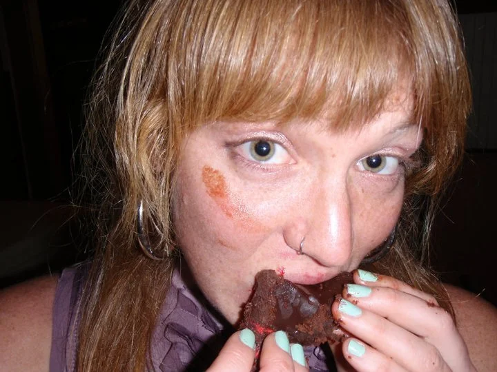 This is me eating chocolate cake. The image of my brownies will never fade from my memory, though I did not store them in my phone :/