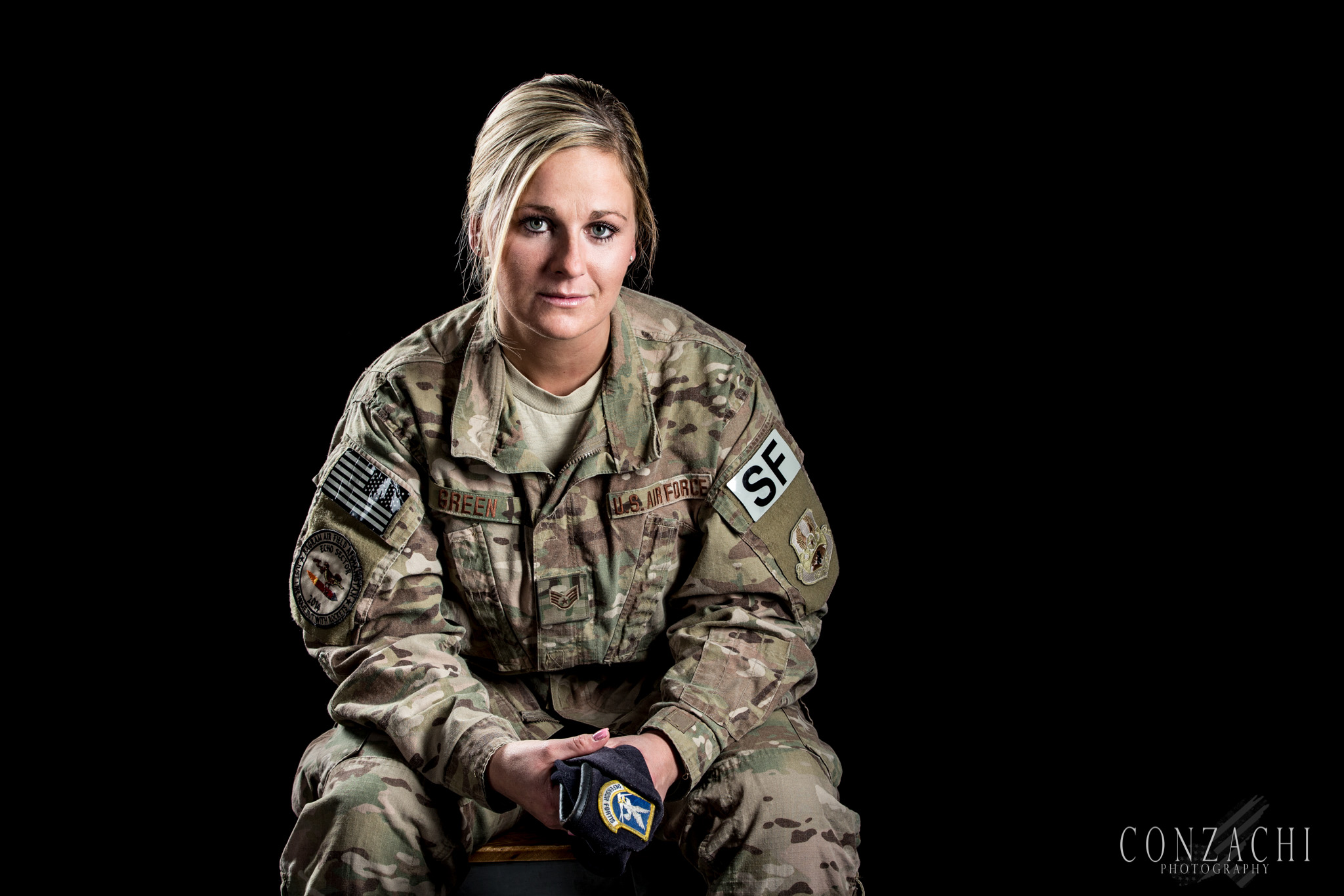 Jillian Green, 28 Branch: Air Force Status: Air National Guard MOS: Security Forces Years Served: 2005-Present Highest Rank: E-5 Staff Sergeant Deployments: Afghanistan - Guantanamo, Cuba Her Story: "My name is Jillian Green, formerly DeCair. I joined the US Air Force on December 2nd, 2005. The missions that I've been on are a bit crazy. Two Deployments, and three detainee missions. I have been in the Security Forces for over 10 years, and now am a member of the 152nd HQ Squadron in Reno, NV. I will continue to serve my country as long as they'll allow me to. My life consists of Integrity first, Service before self, and Excellence in all we do! Born and raised Battle Born - SSGT Green." From the Author: Jillian and I first met about 5 years ago in Reno, NV through mutual friends. Although her story is very humble and short, she is an amazing human being that has done incredible things, and has a beautiful family that she would do anything for. With a strong husband and 2 beautiful girls, she deployed and they stayed behind to take care of the home front. On veterans day 2014, her husband Josh brought Jillian home to us in form of a cardboard cutout at our local parade. It was their way of having her with them during the holiday, while she was overseas deployed, keeping our country and its citizens safe. She may not talk about it much, but I can only imagine how hard it was to leave her family behind as she went off to war, which traditionally is the other way around. Jillian is a dear friend, and sister in arms, and I have so much respect for her and the sacrifices she makes every day for her family. Thank you Jill. You'll always be a great friend and sister in arms. Happy Veterans Day.